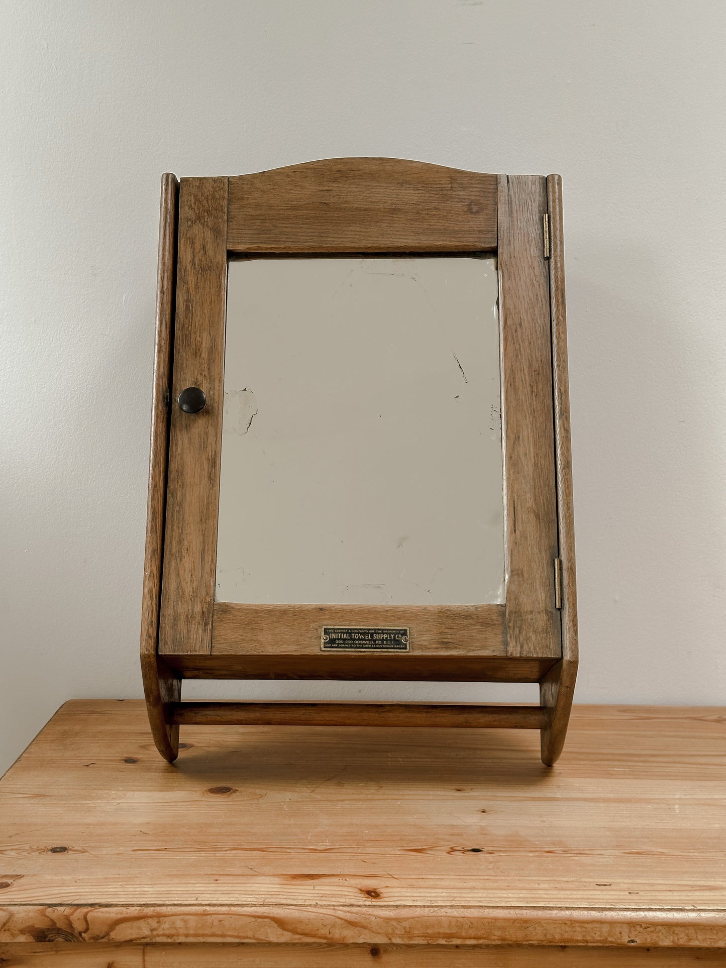Vintage mirrored cabinet with towel rack