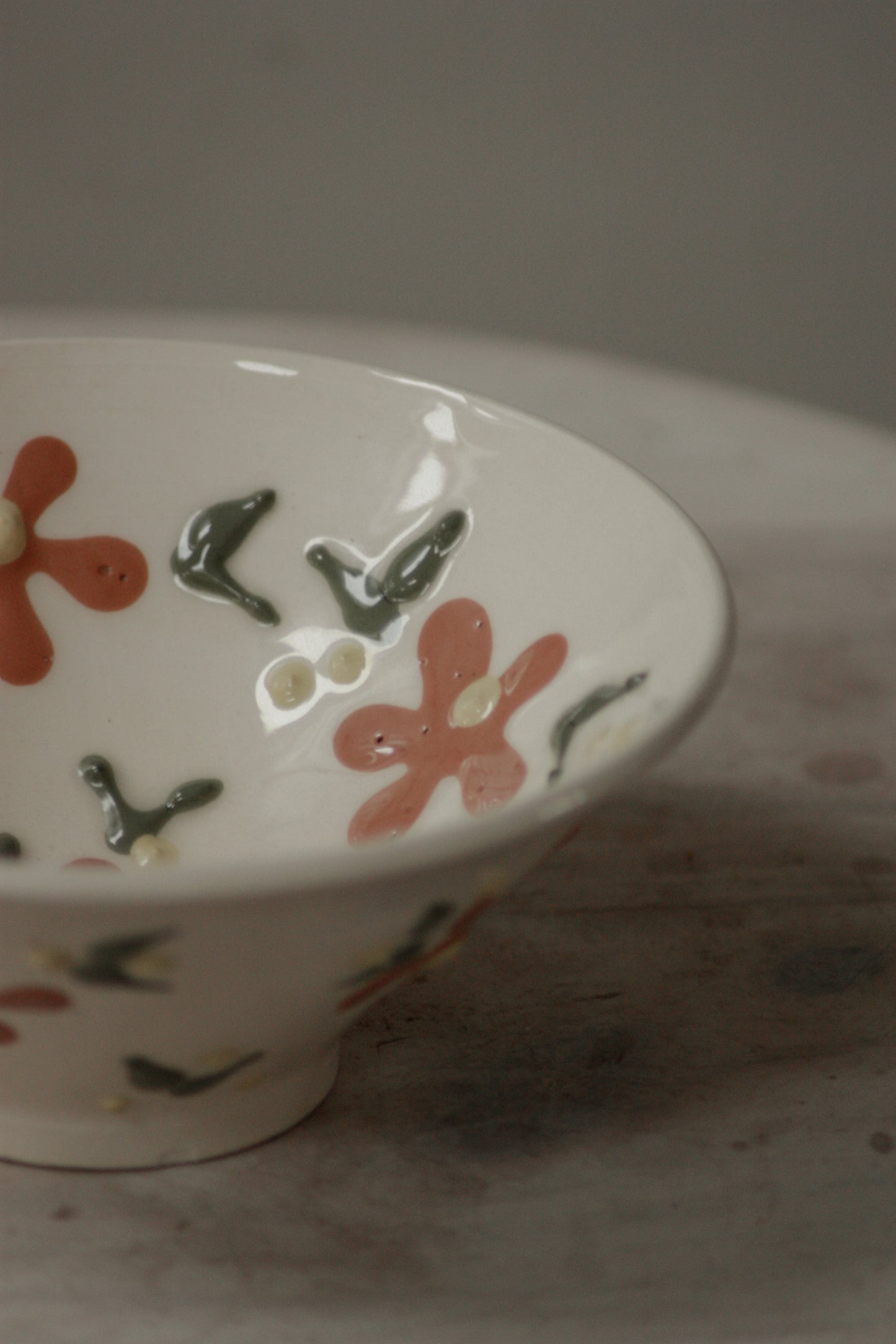 Vintage studio pottery decorative bowl in floral design