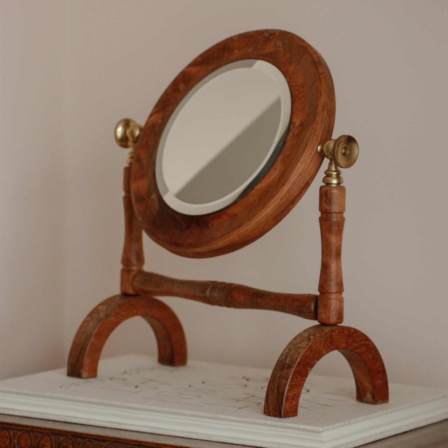 Vintage free-standing bevelled mirror with brass details