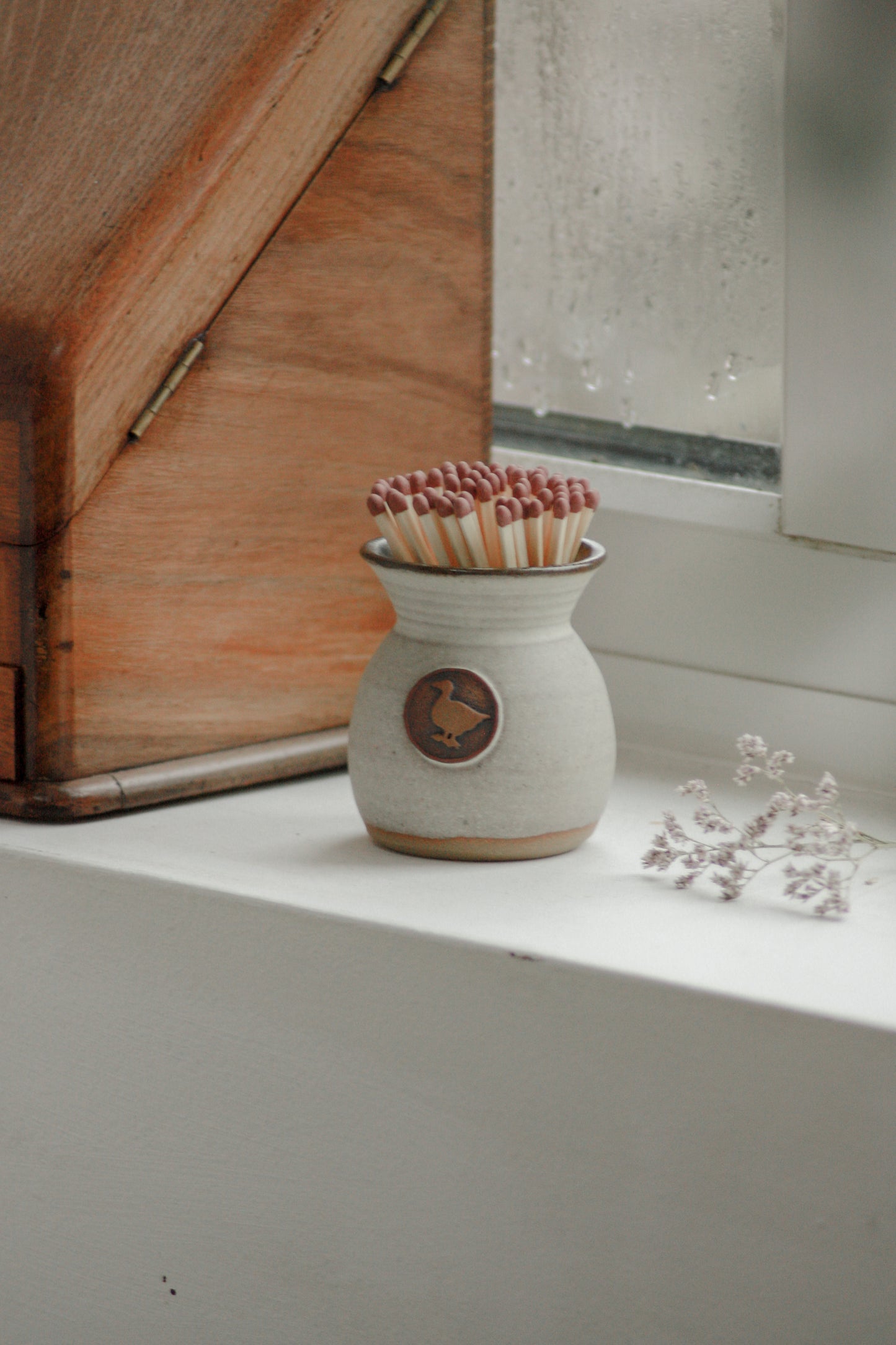 Vintage pottery match pot with duck motif
