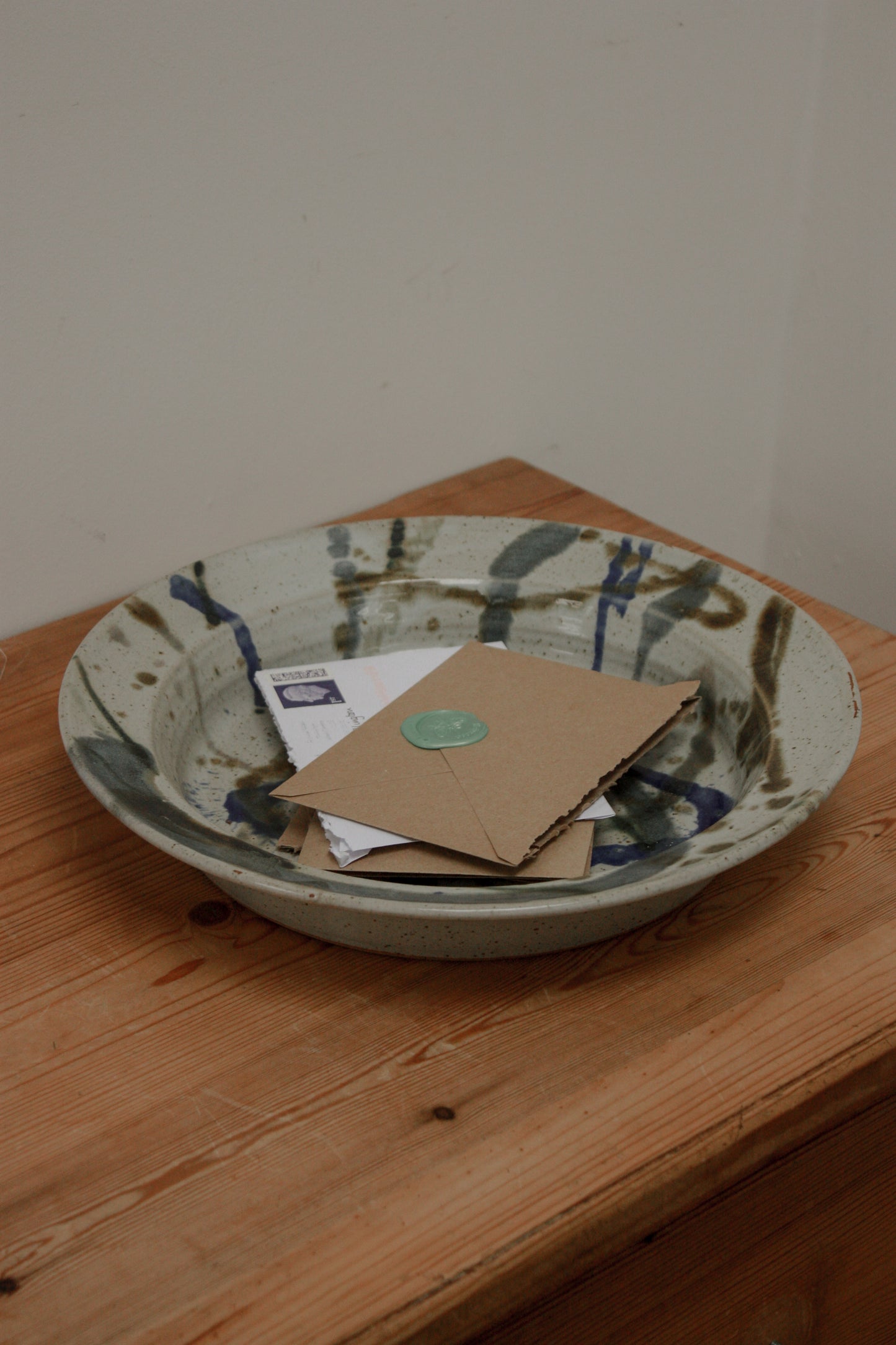 Studio pottery dish with abstract design