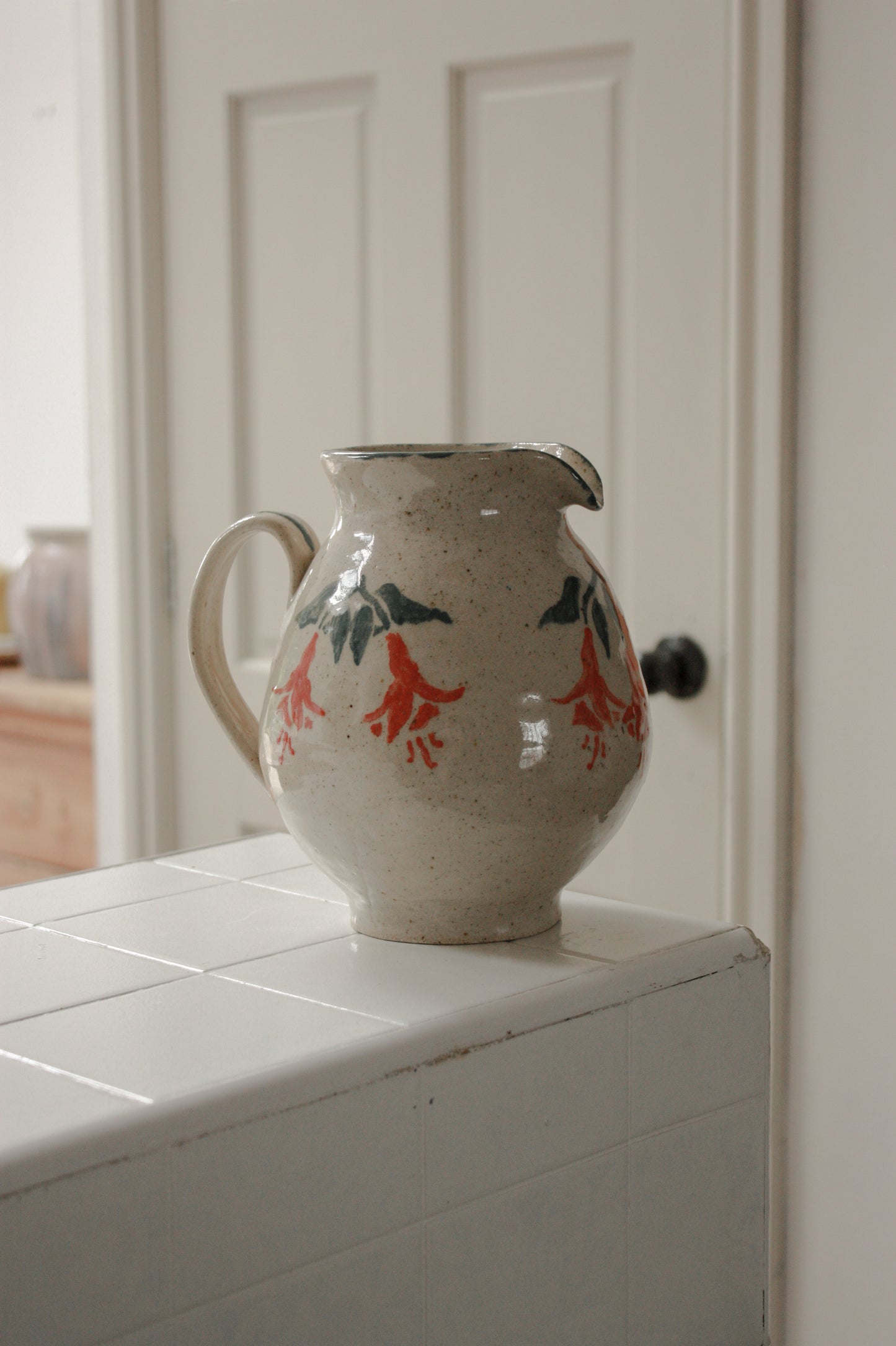 Vintage art pottery floral fuscia pitcher