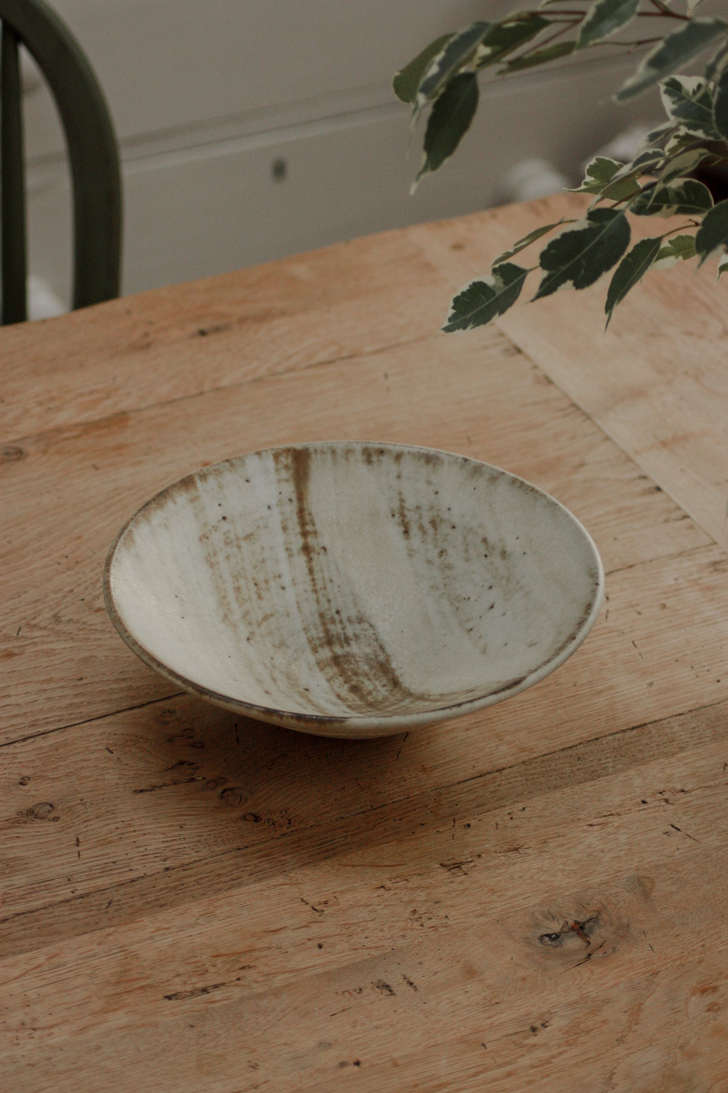 Vintage studio pottery bowl with rustic glaze