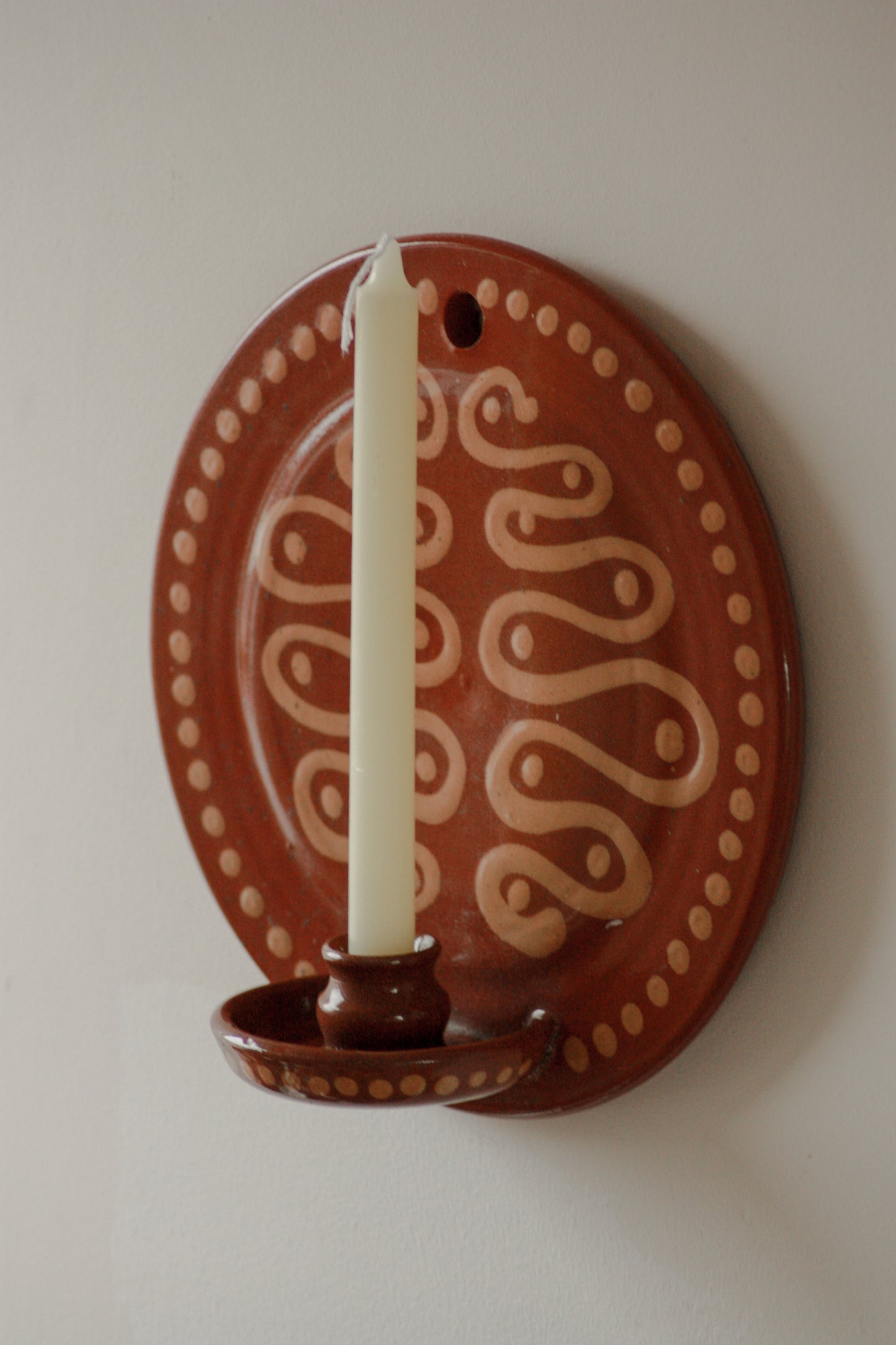 Vintage clay candle sconce with slip glaze