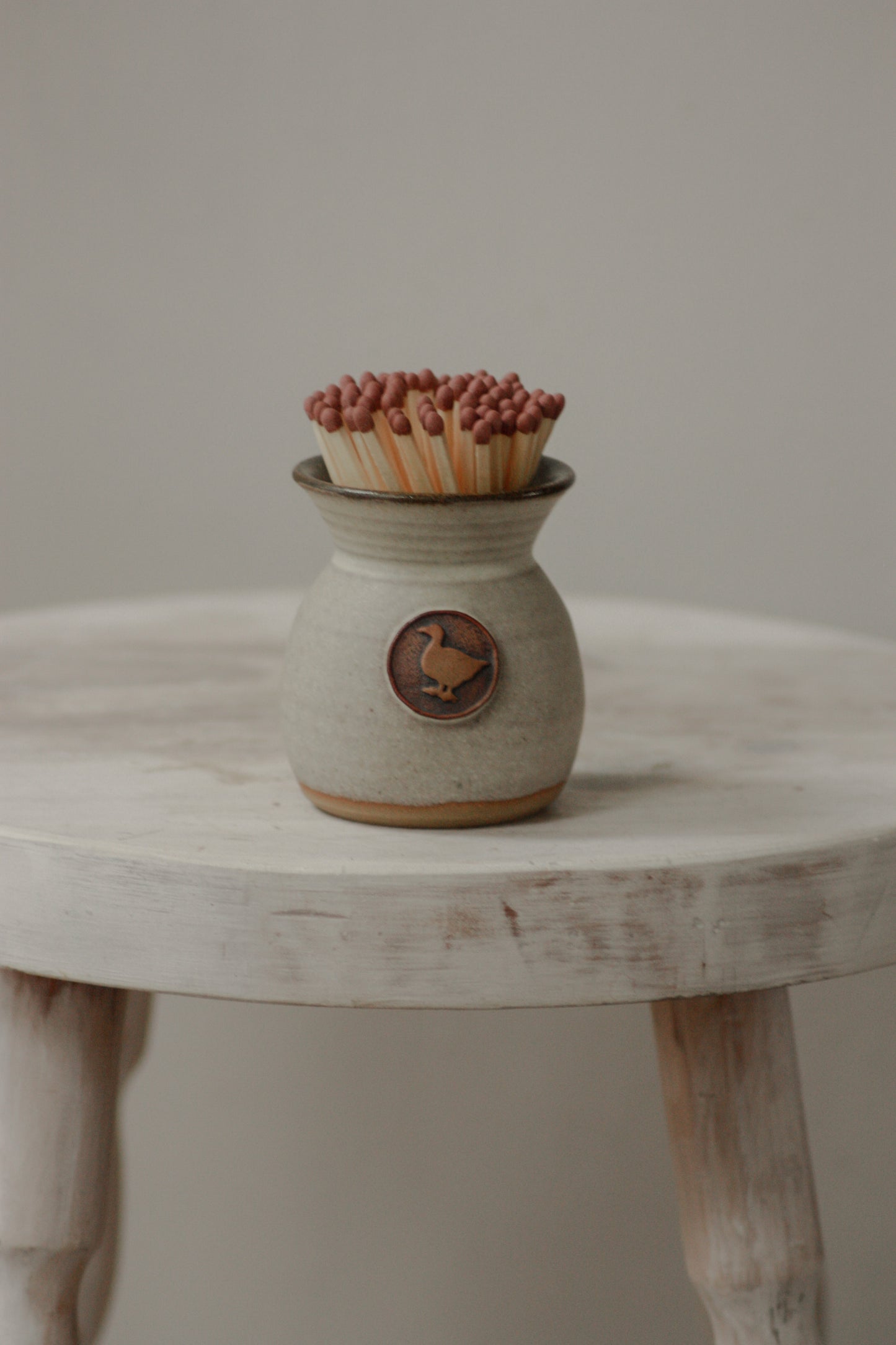 Vintage pottery match pot with duck motif