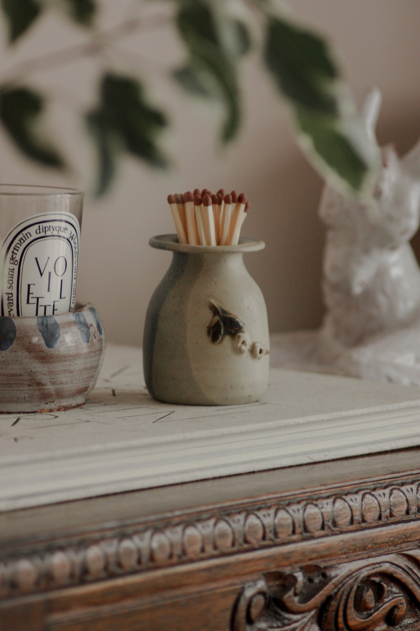 Vintage studio pottery bud vase / match pot with floral detail
