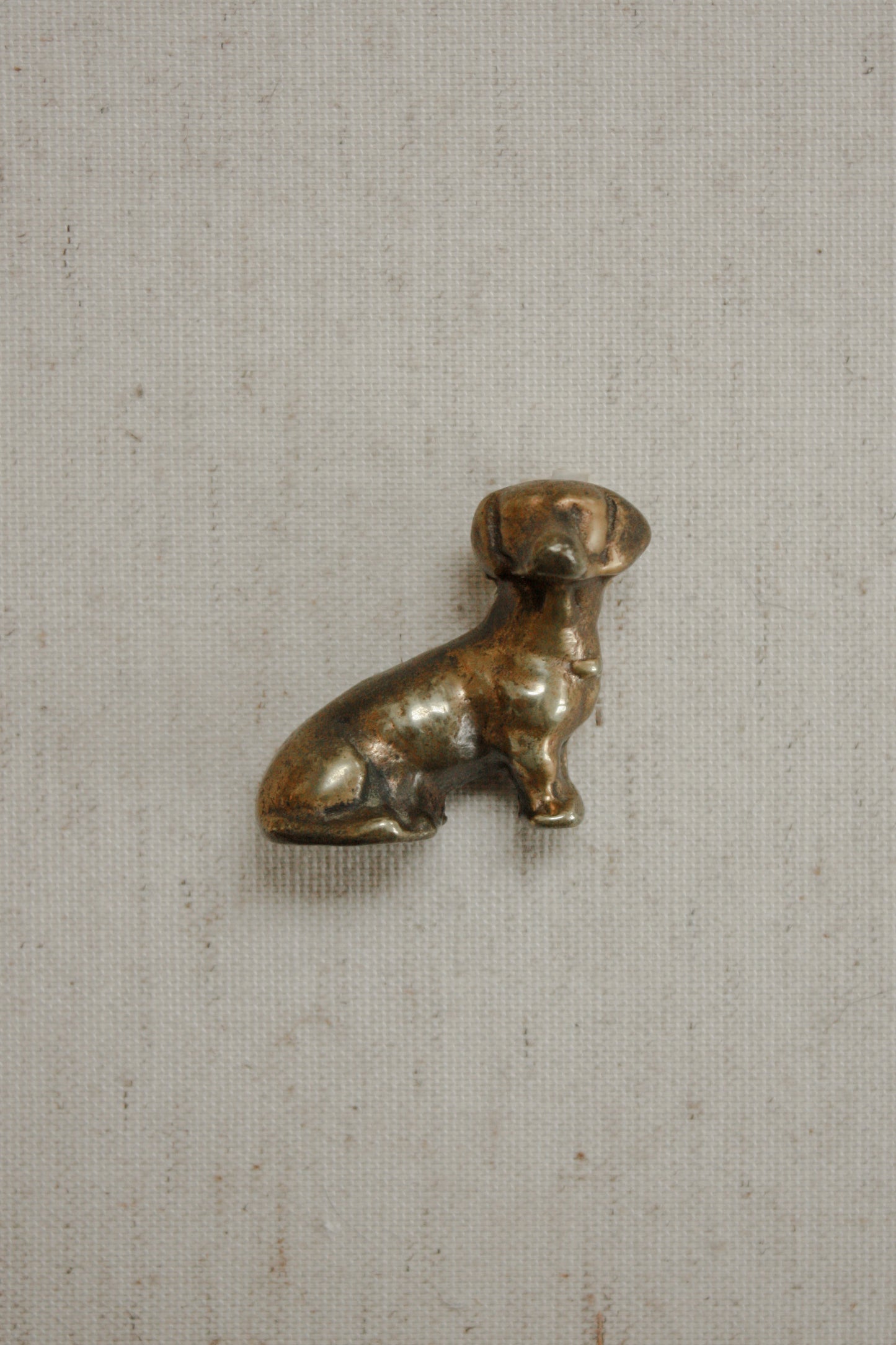 Vintage solid brass sausage dog paperweight