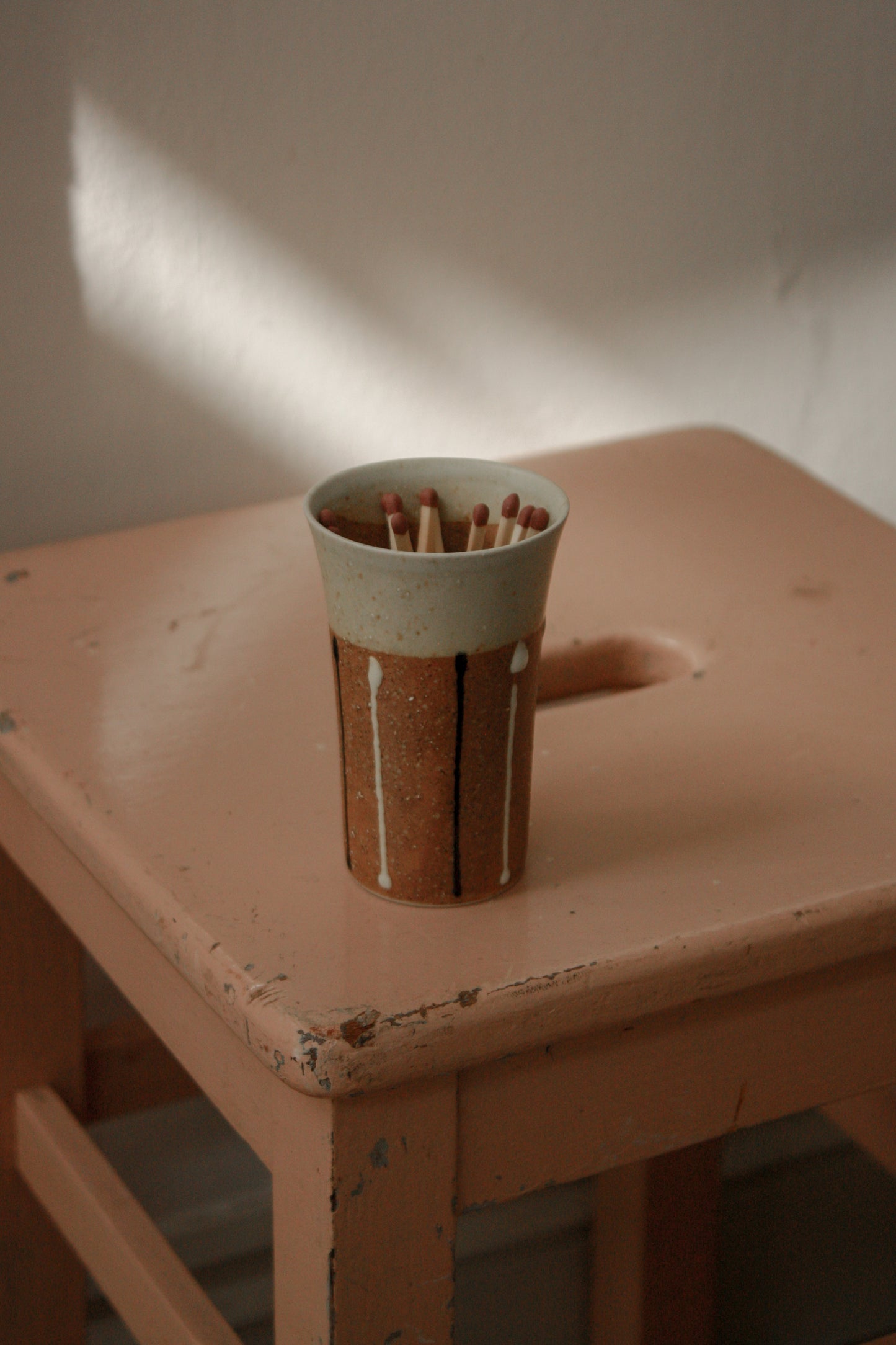 Contemporary pottery match pot