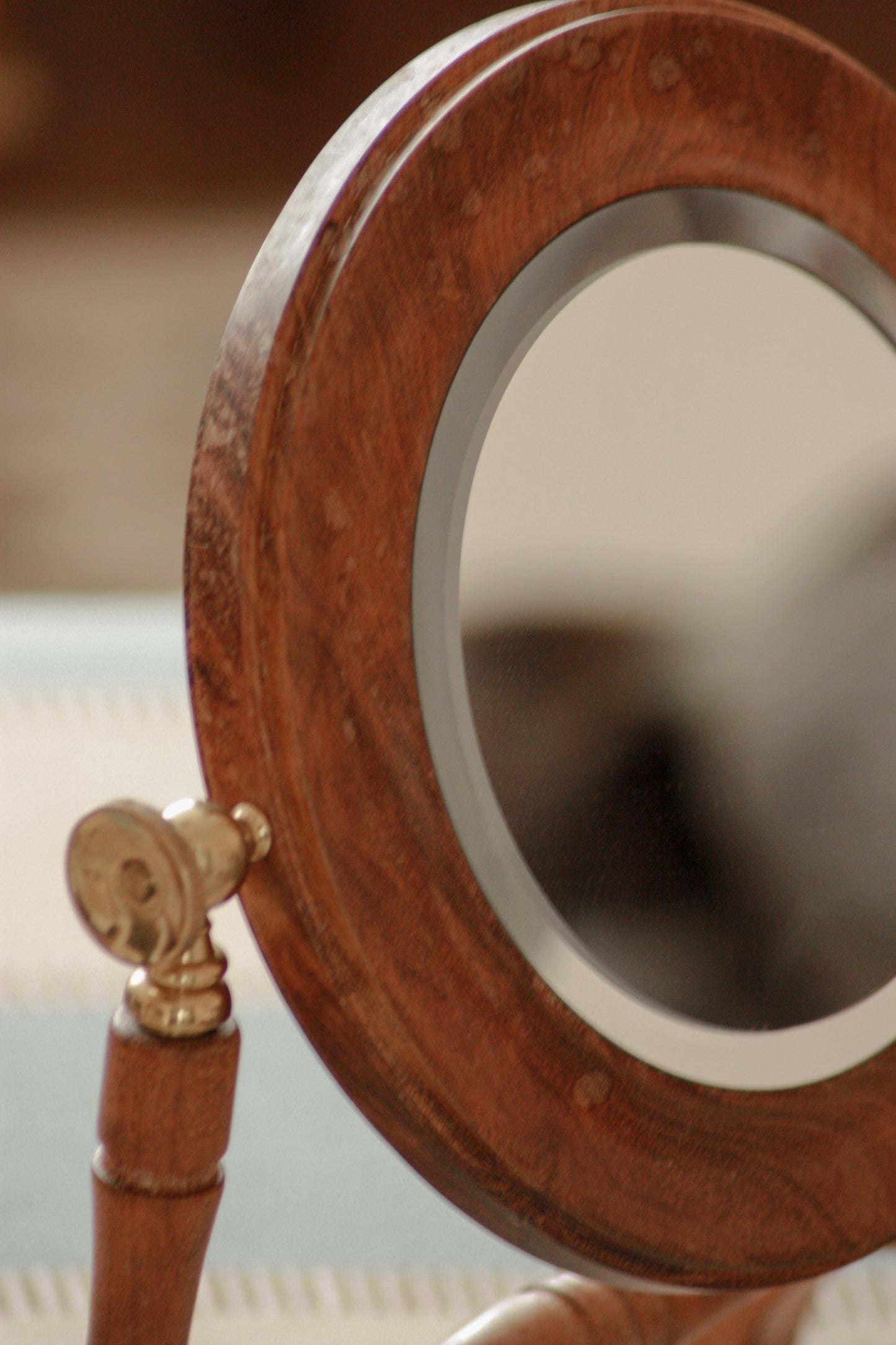 Vintage free-standing bevelled mirror with brass details