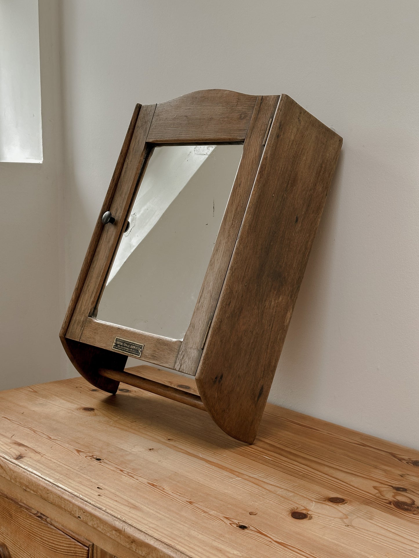 Vintage mirrored cabinet with towel rack