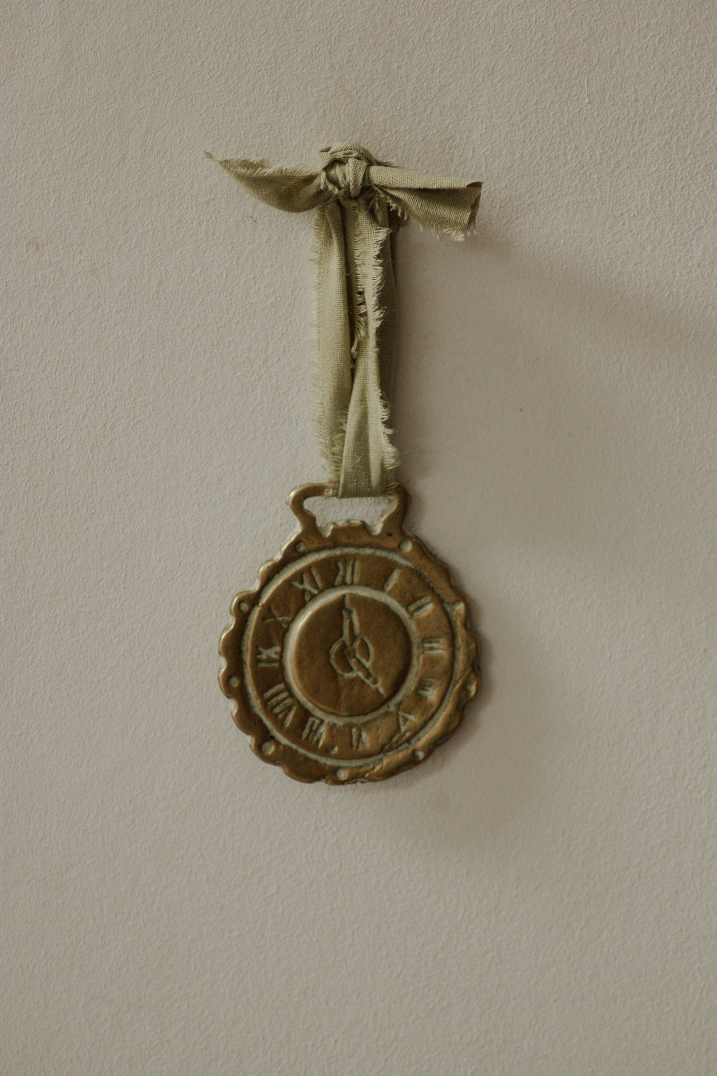 Vintage brass clock horse brass token