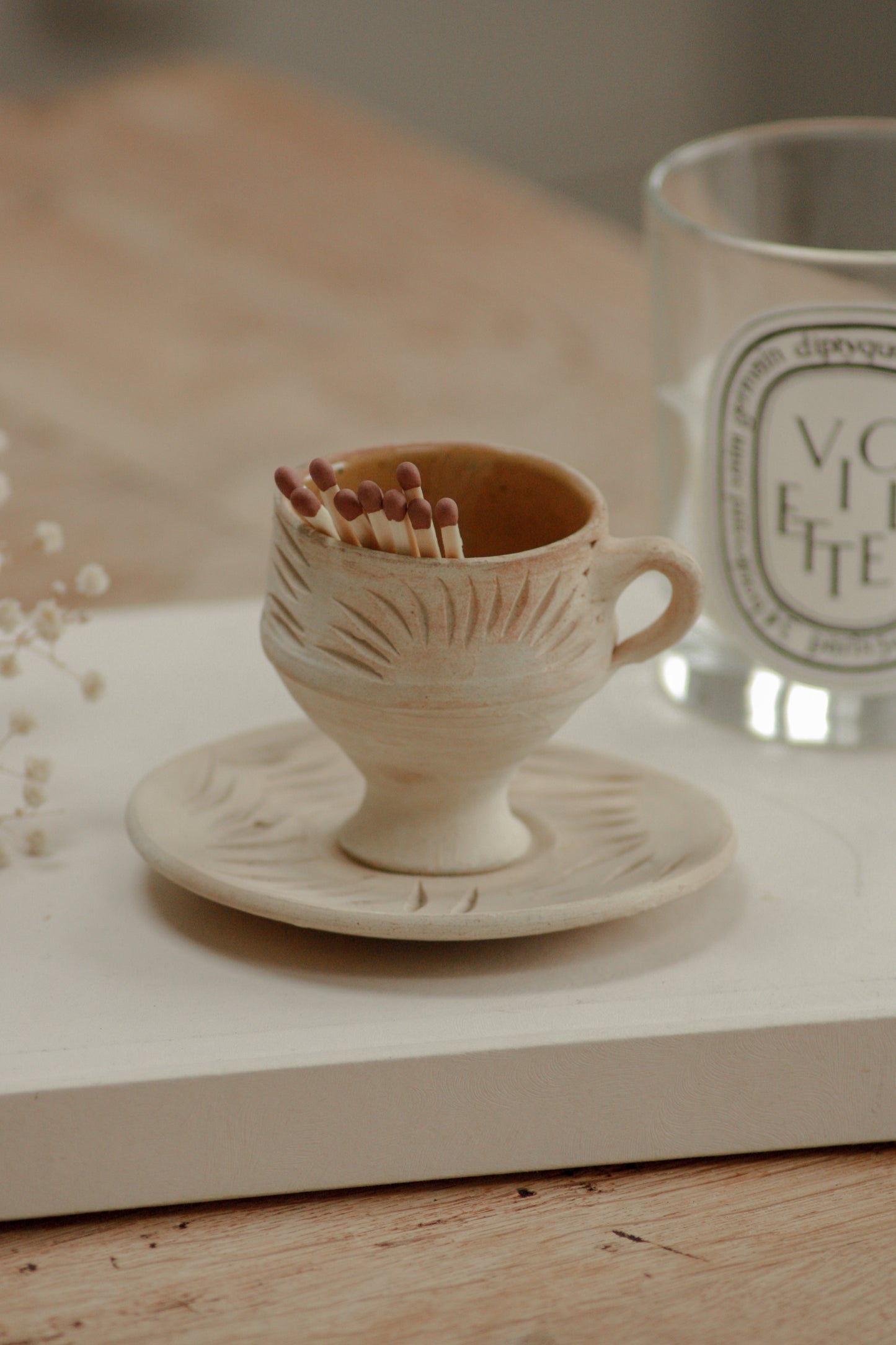 Folk art teacup and saucer matchpot