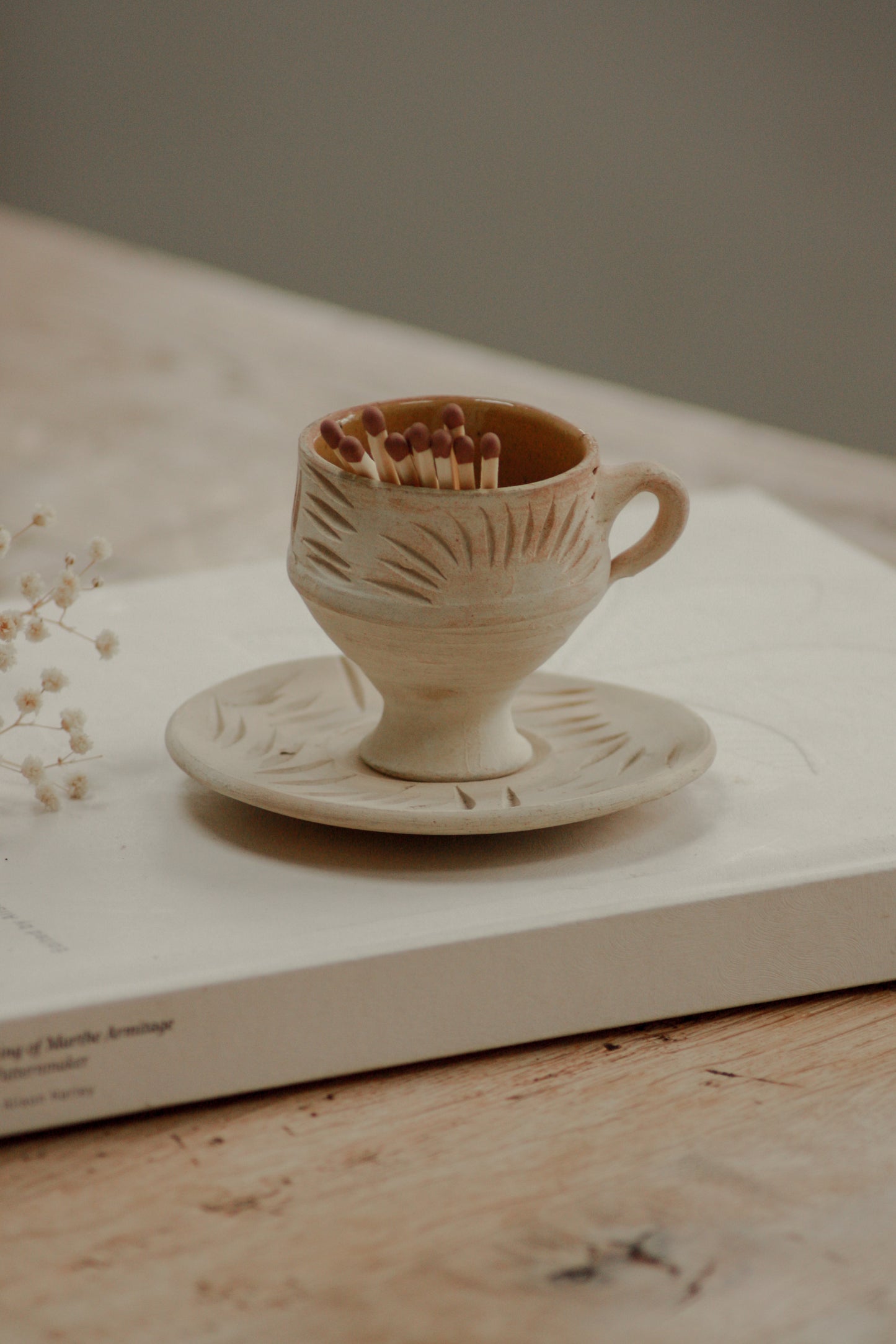 Folk art teacup and saucer matchpot