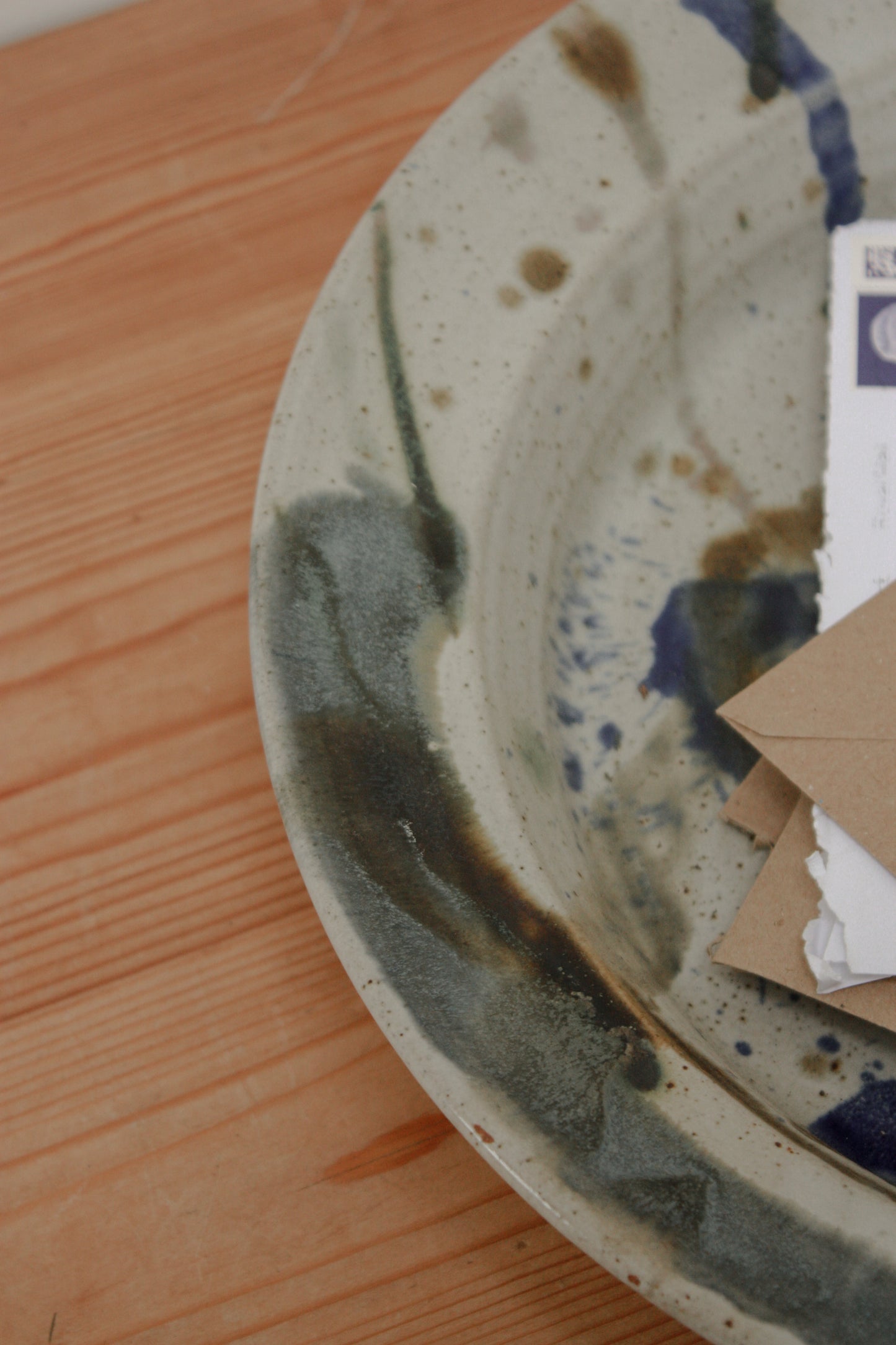 Studio pottery dish with abstract design