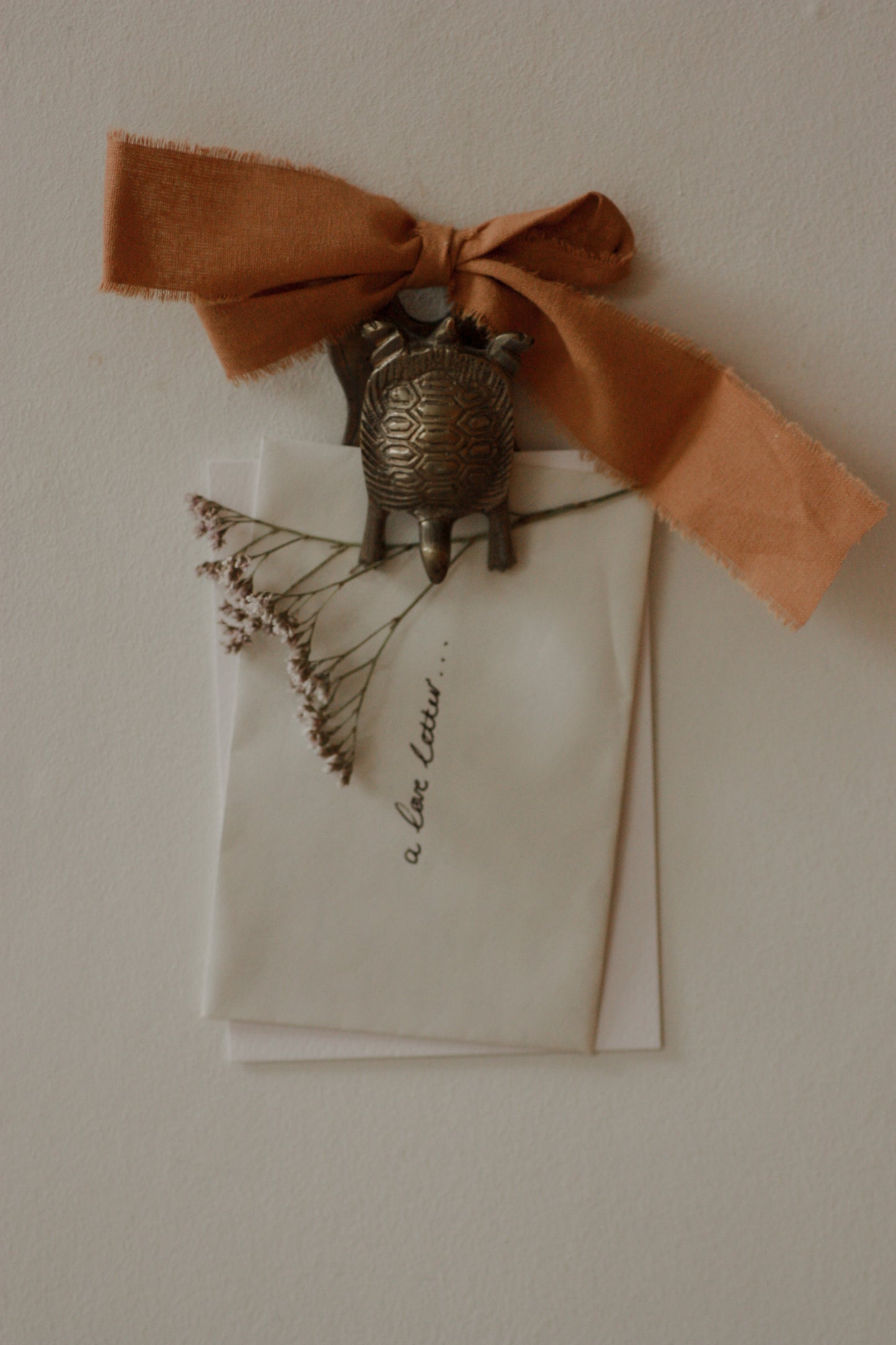 Vintage brass tortoise letter clip