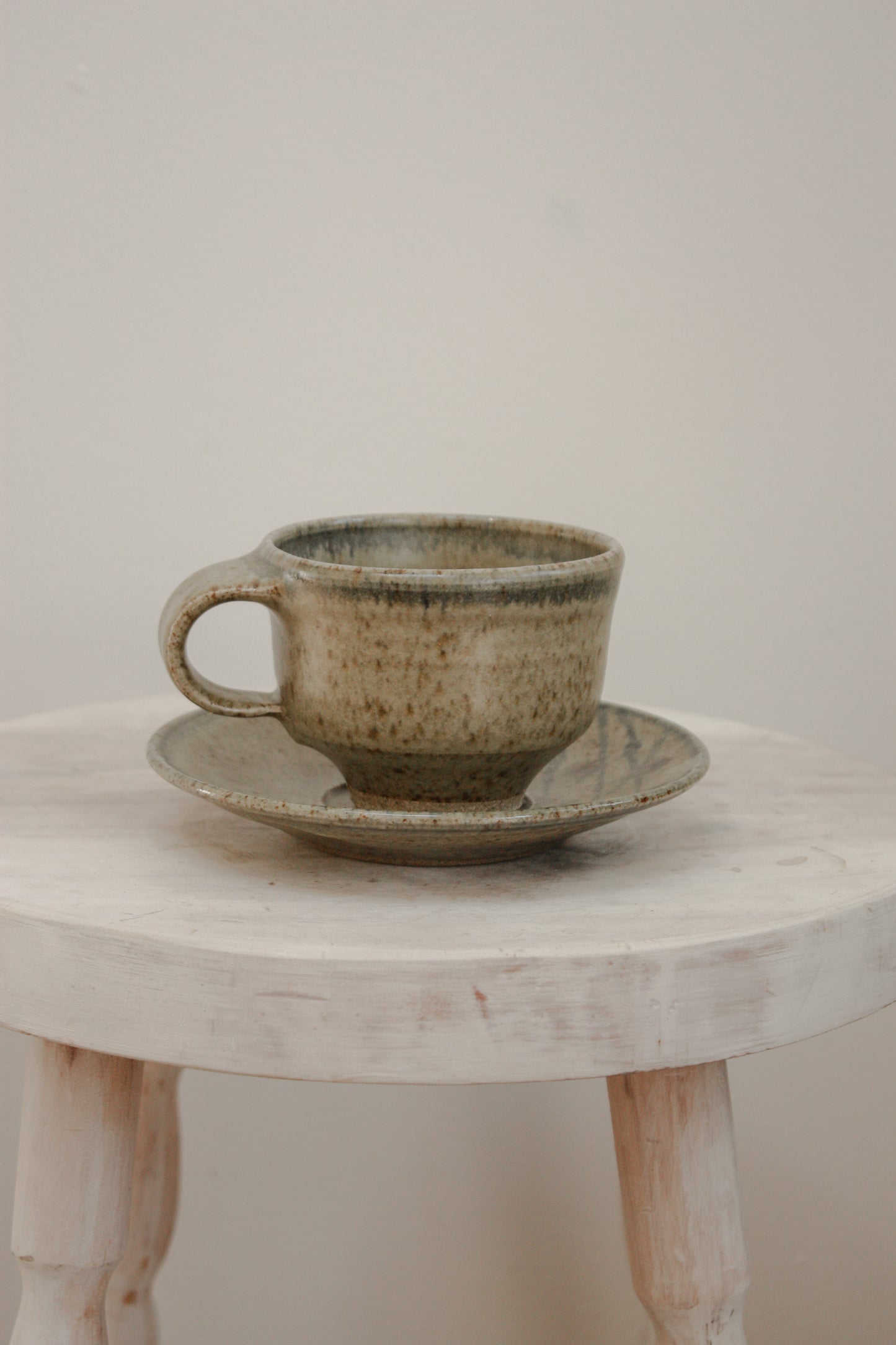 Pair vintage studio pottery cups and saucers