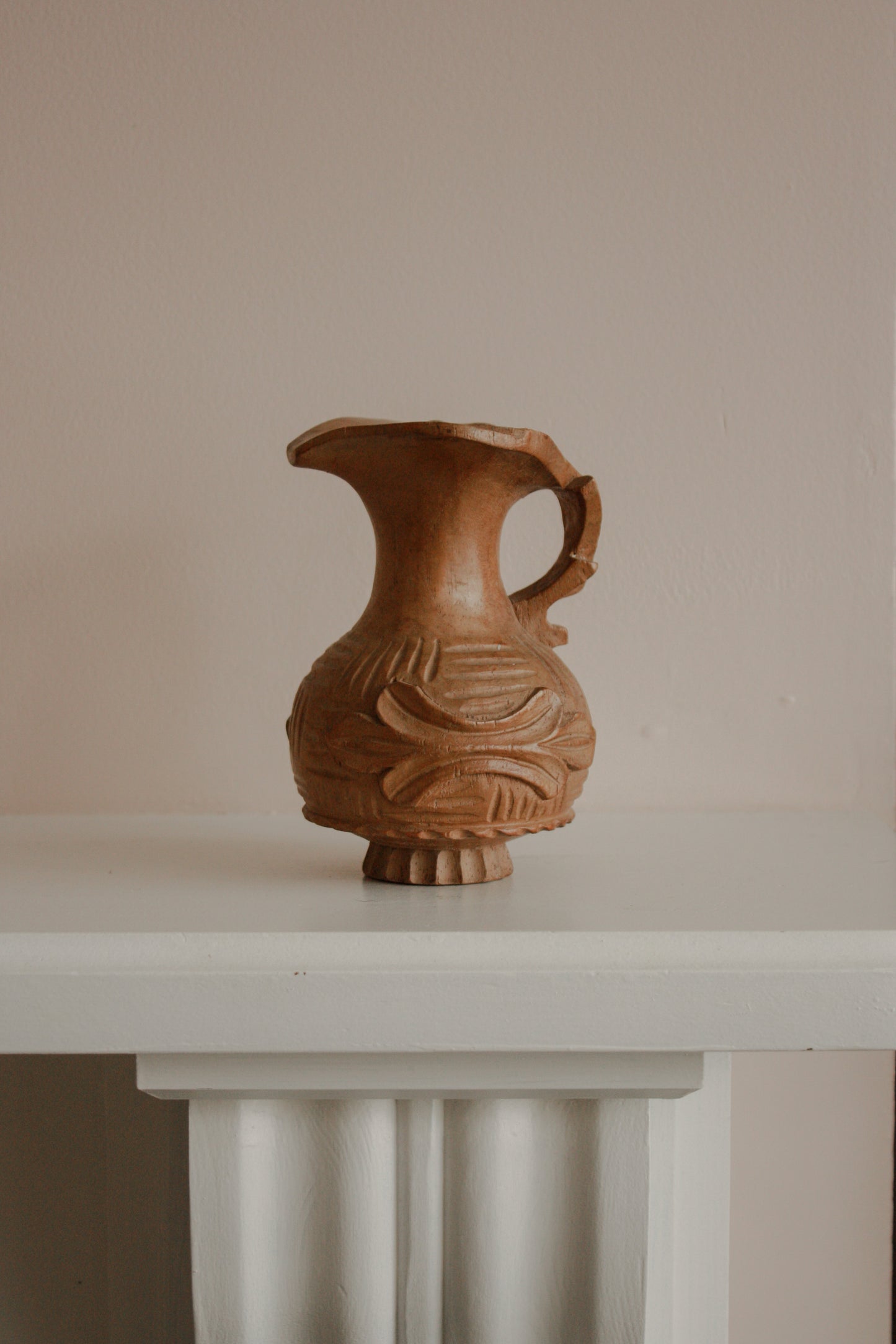 Vintage carved wooden decorative vessel
