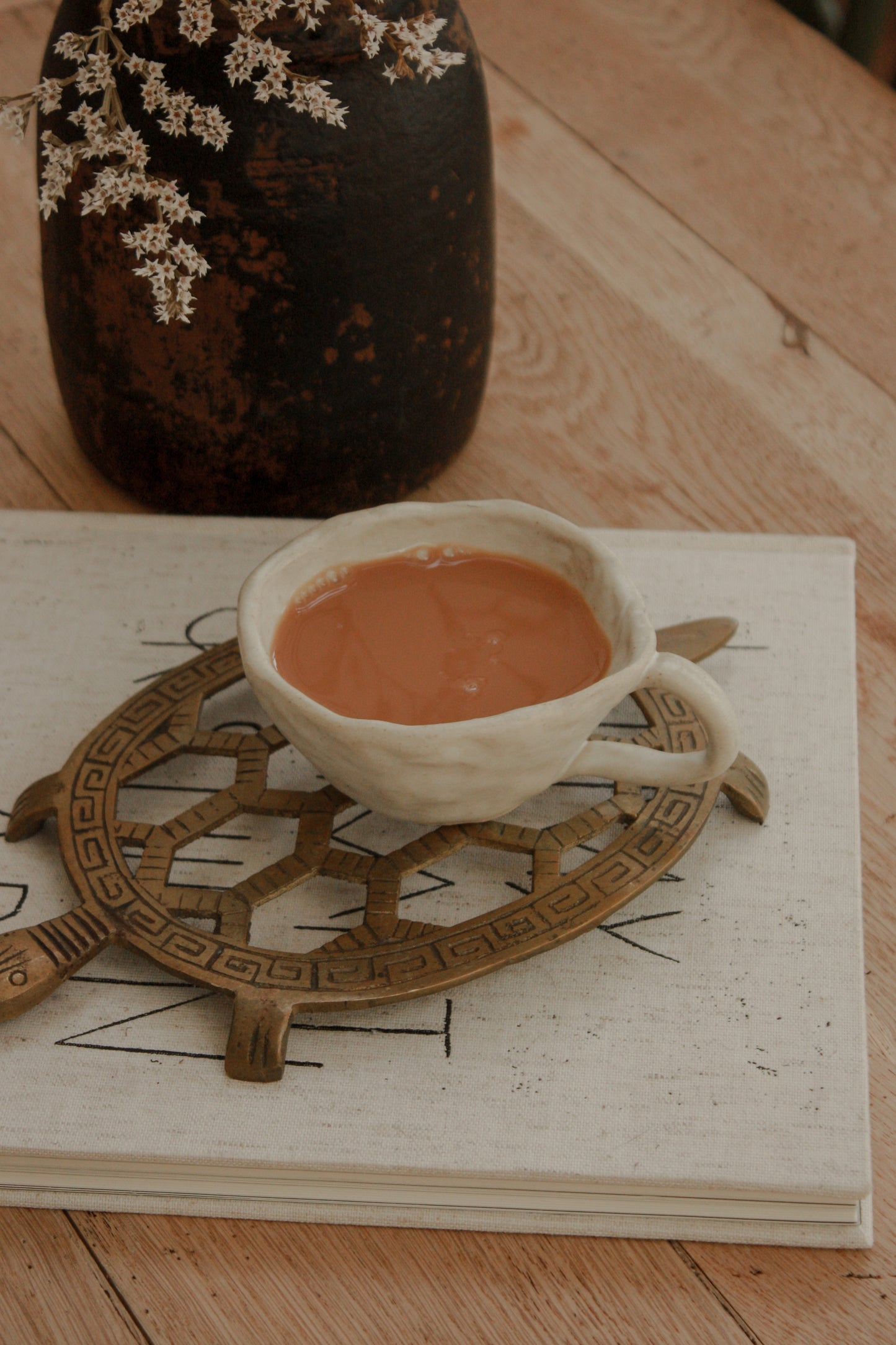 Folk art pottery teacup