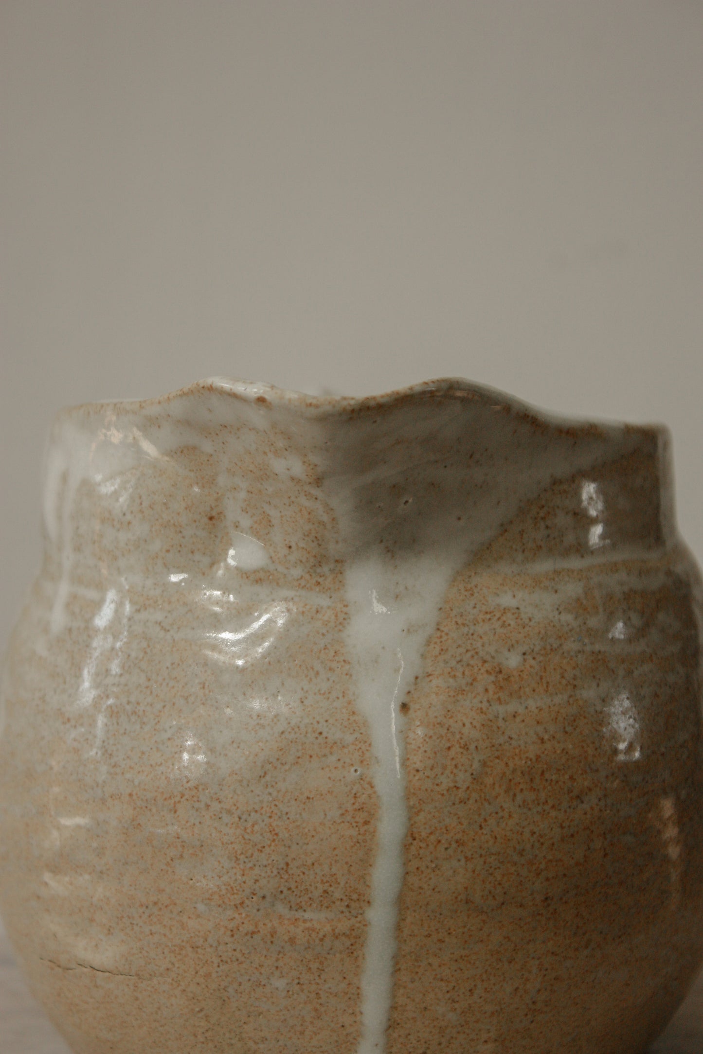 Vintage studio pottery pitcher with wheat design