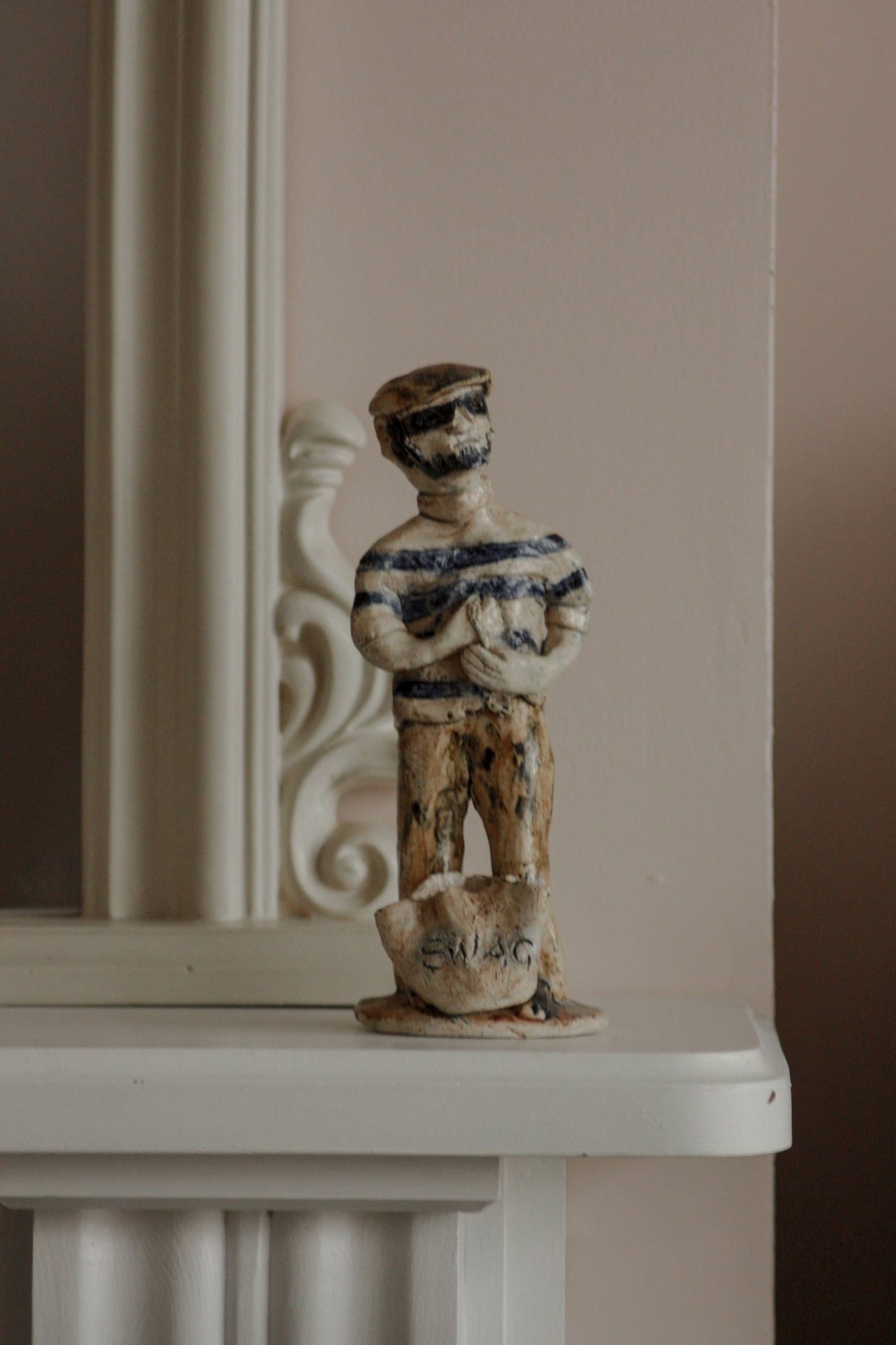 Naive folk art pottery sculpture - The Thief