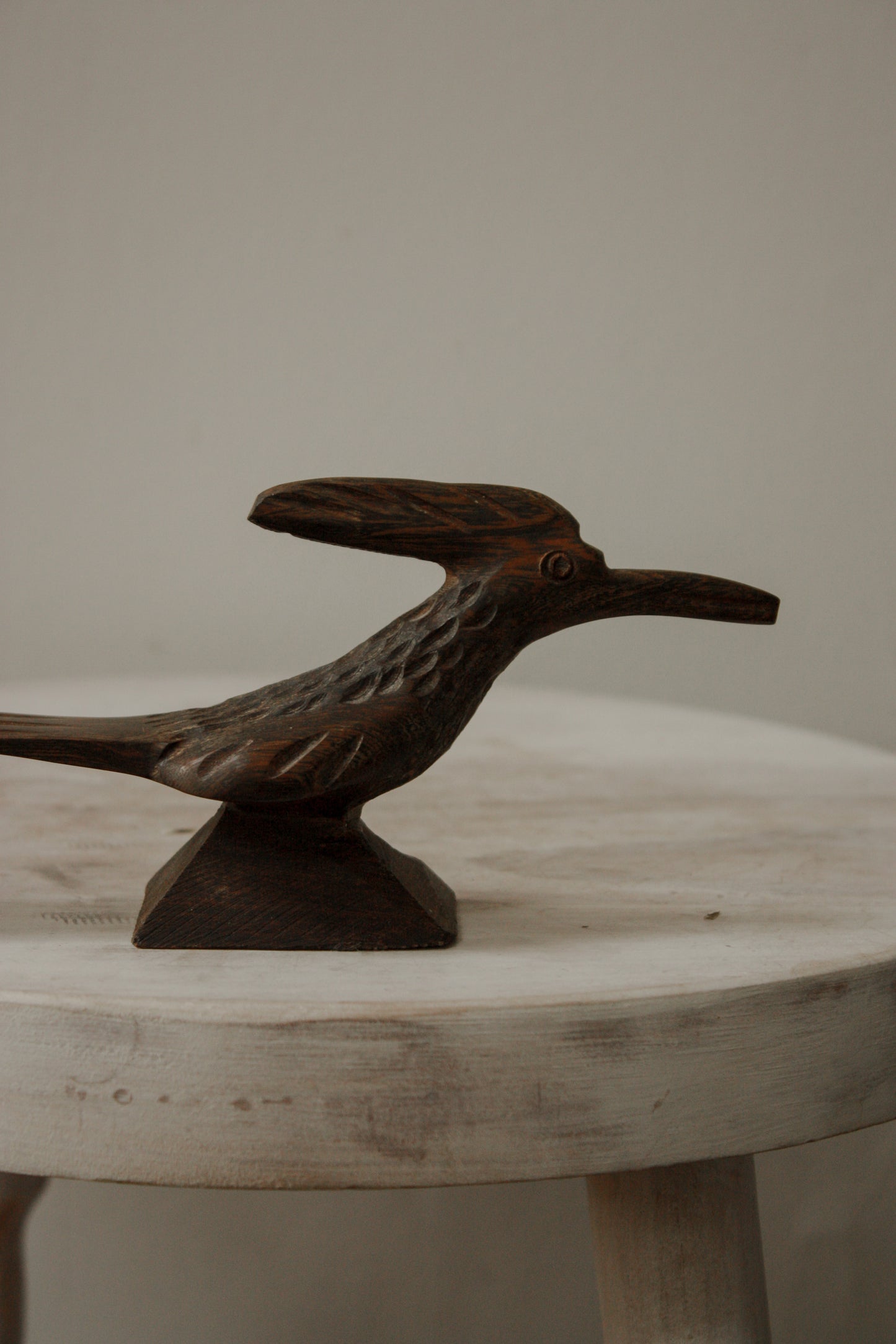 Vintage hand-carved wooden woodpecker