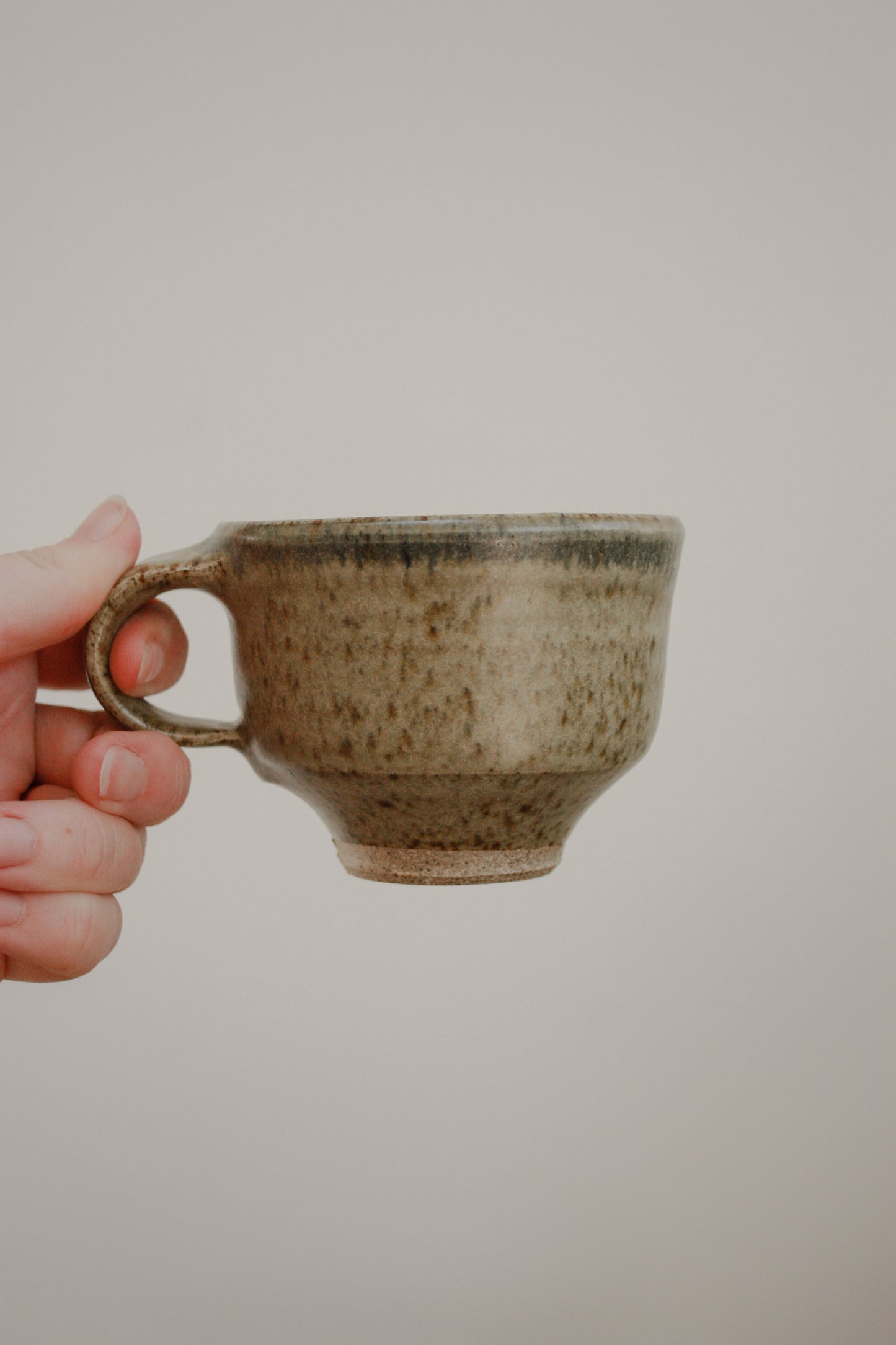 Pair vintage studio pottery cups and saucers