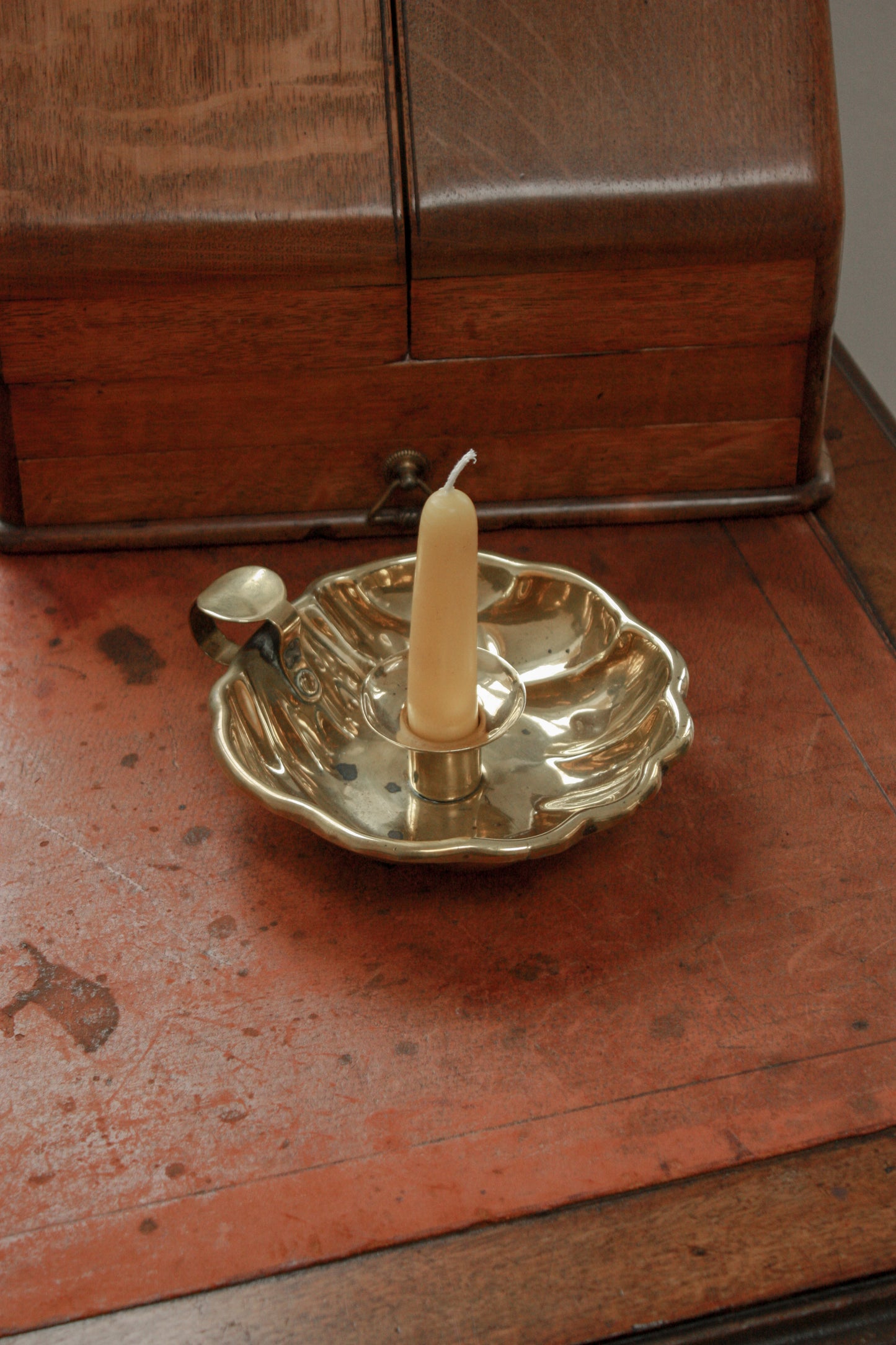 Vintage French brass-plated shell chamberstick