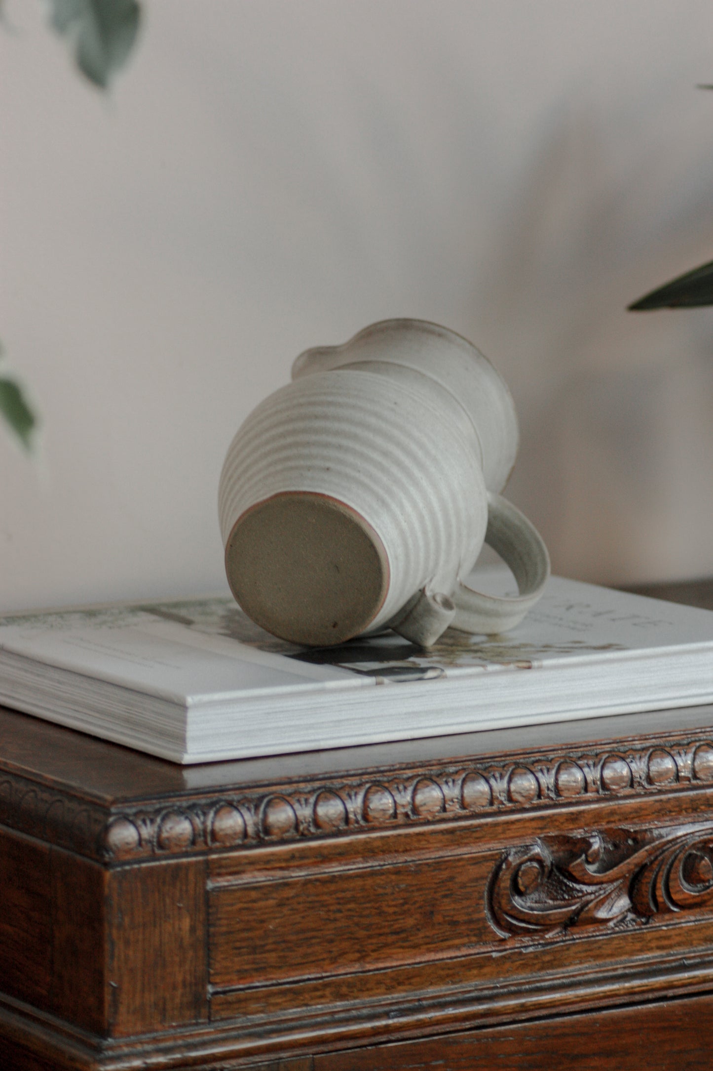 Vintage studio pottery pitcher with rustic glaze
