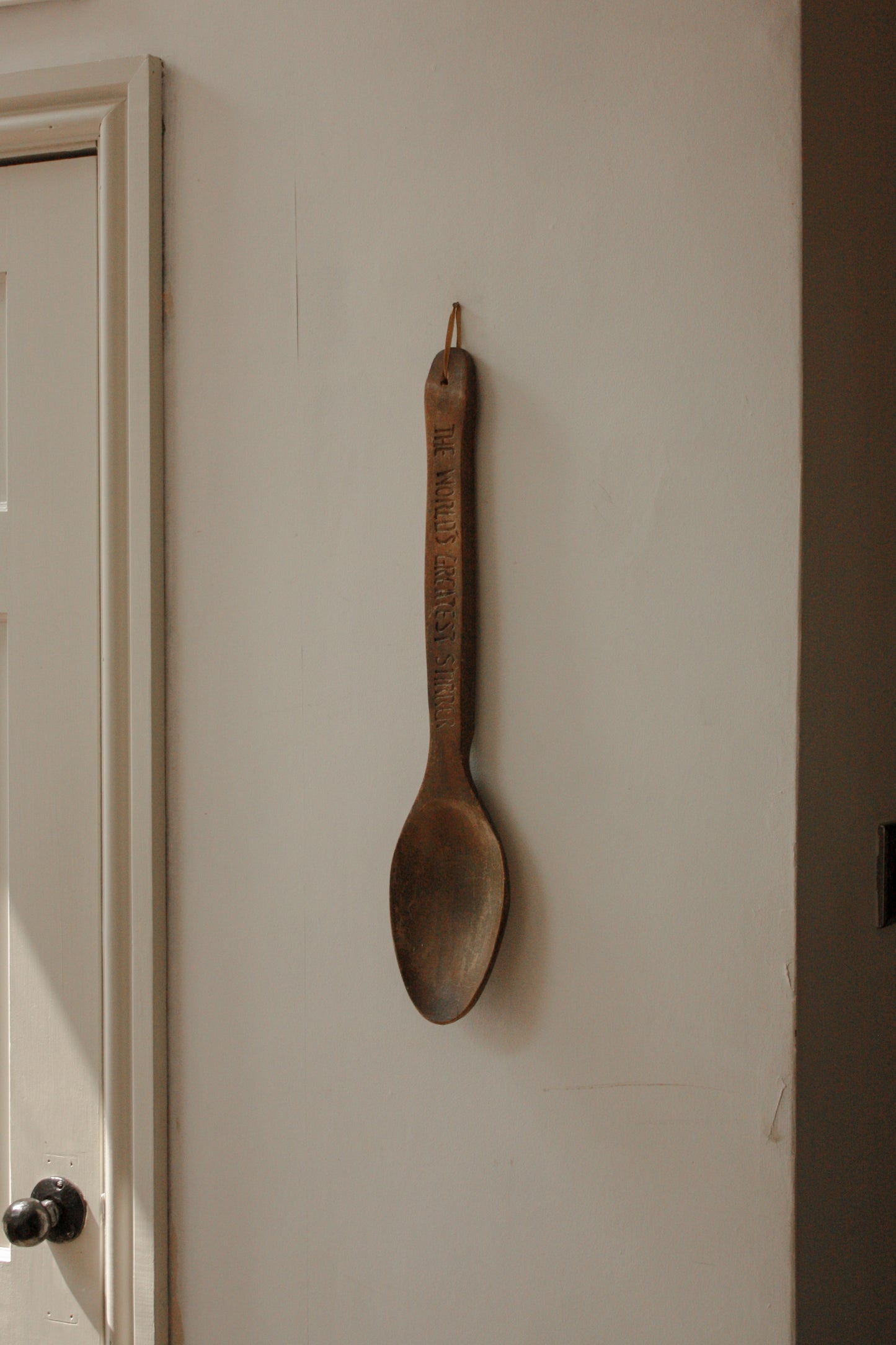 Hand carved wall hanging wooden spoon - World’s Greatest Stirrer