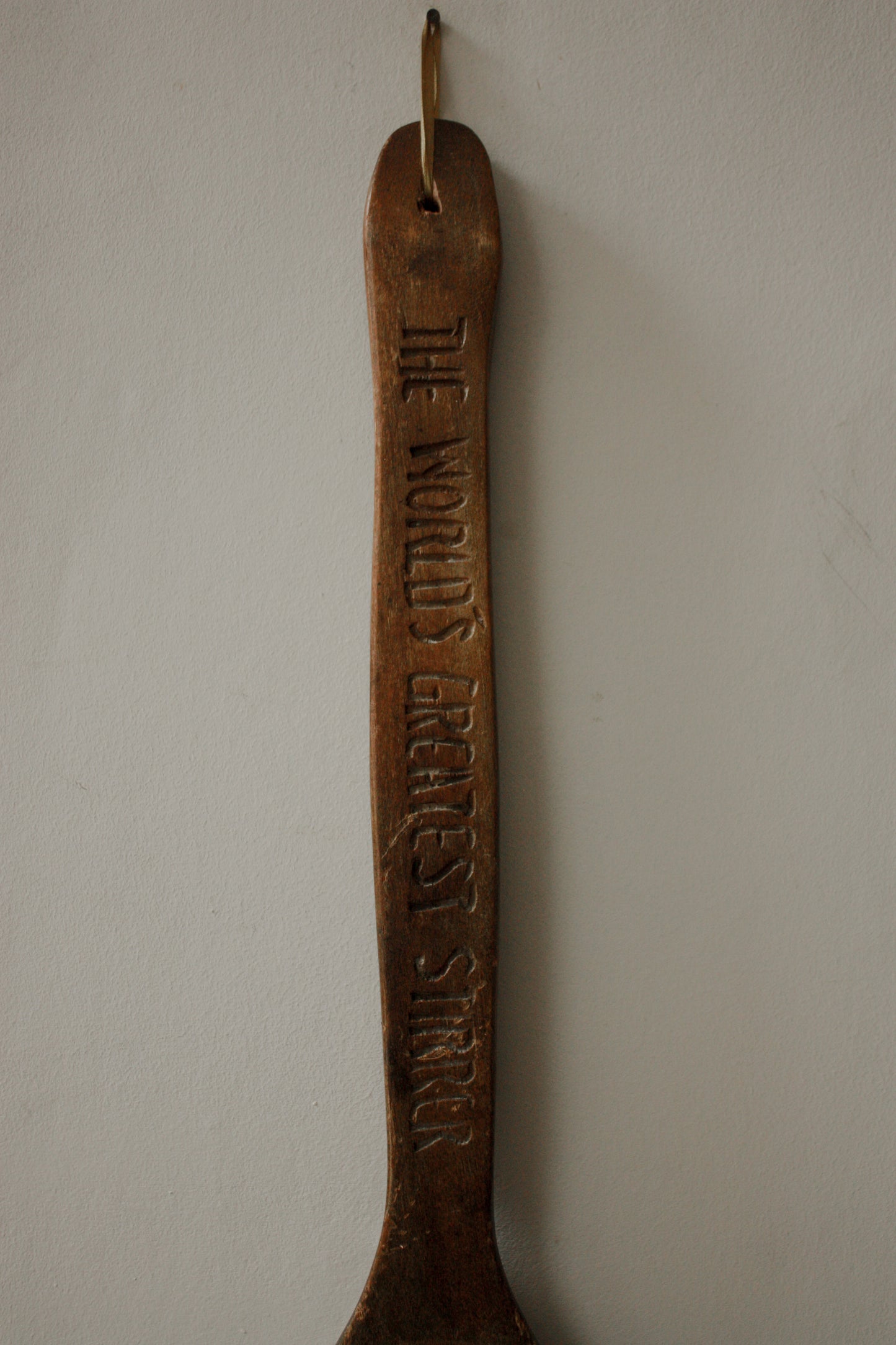 Hand carved wall hanging wooden spoon - World’s Greatest Stirrer