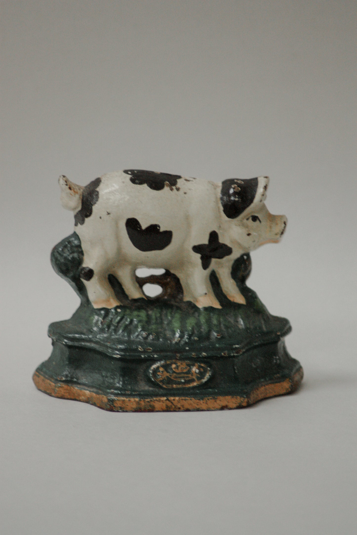 Vintage cast iron pig door stop