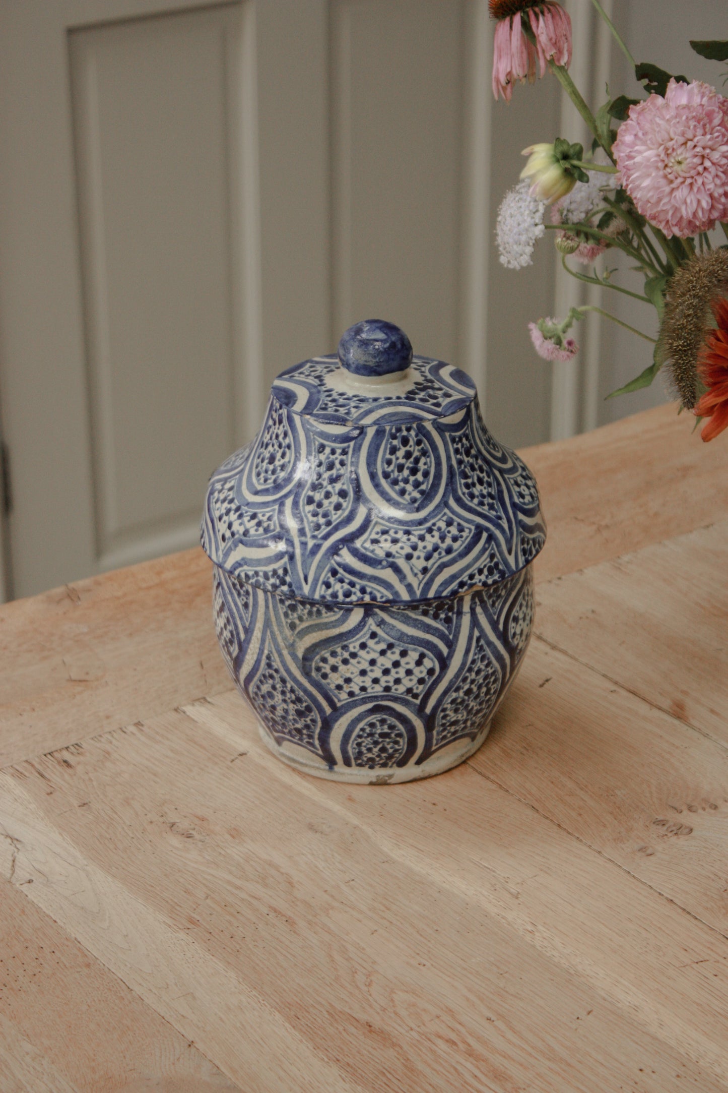 Vintage hand painted blue and white lidded pot