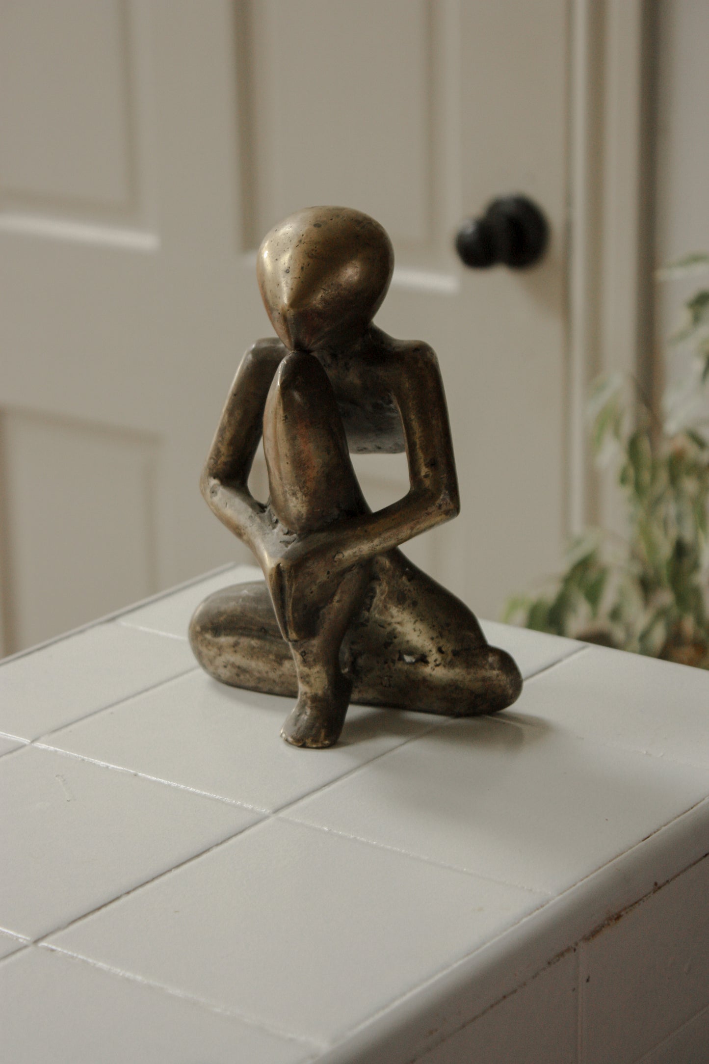 Vintage solid brass sculpture - “Pensive”