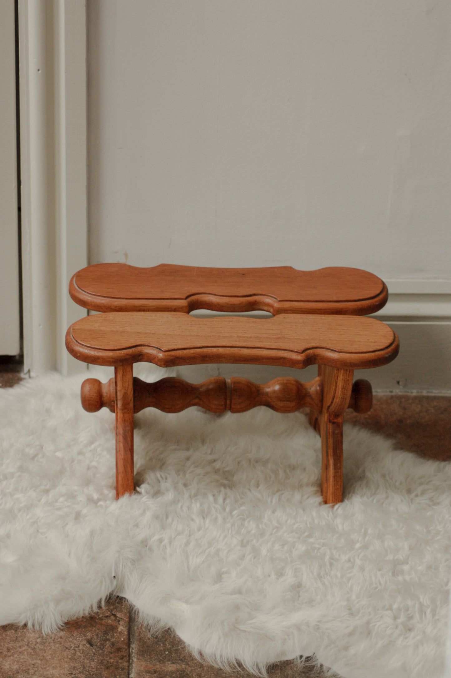 Vintage wooden stool with bobbin detail