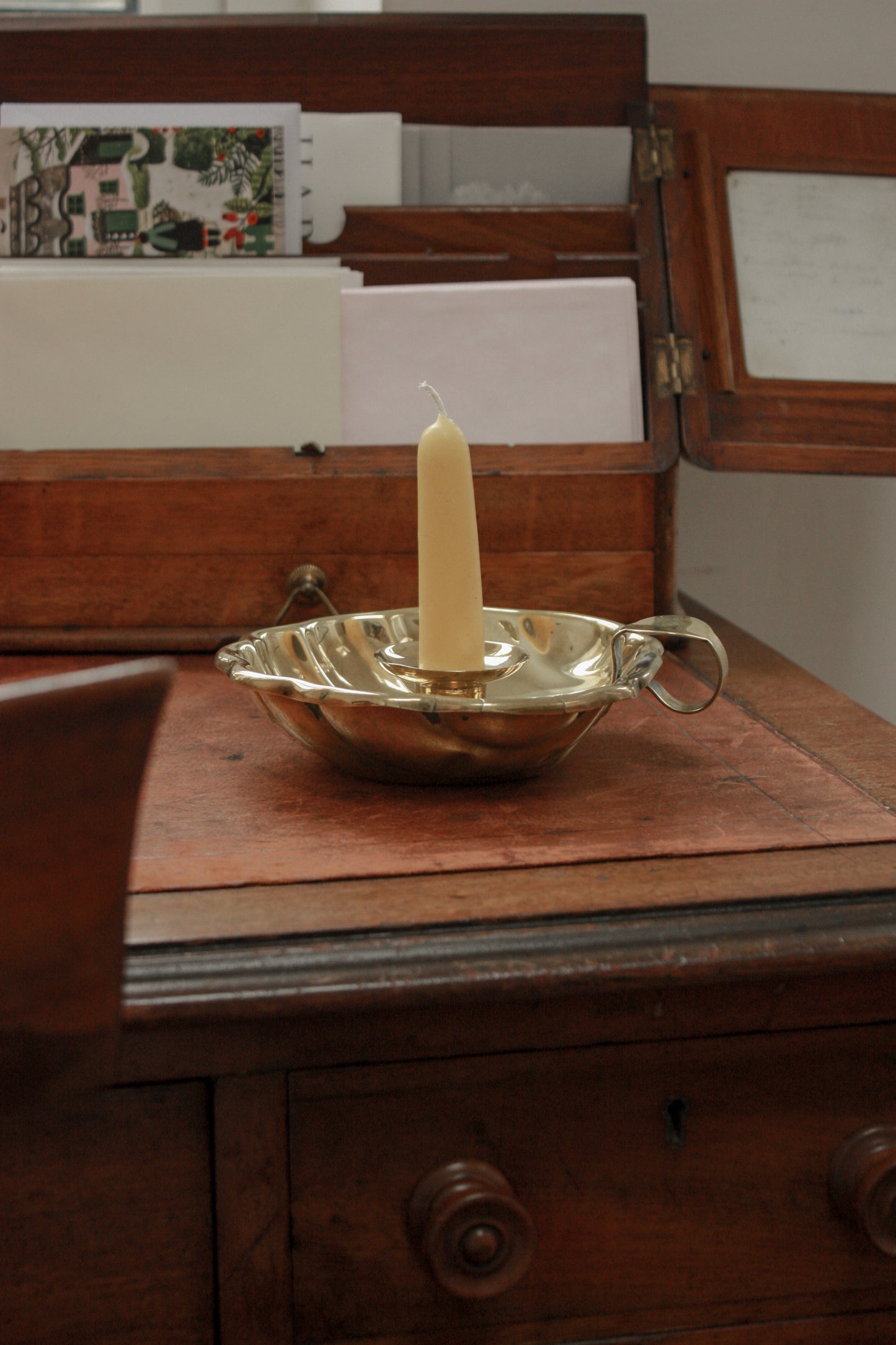 Vintage French brass-plated shell chamberstick