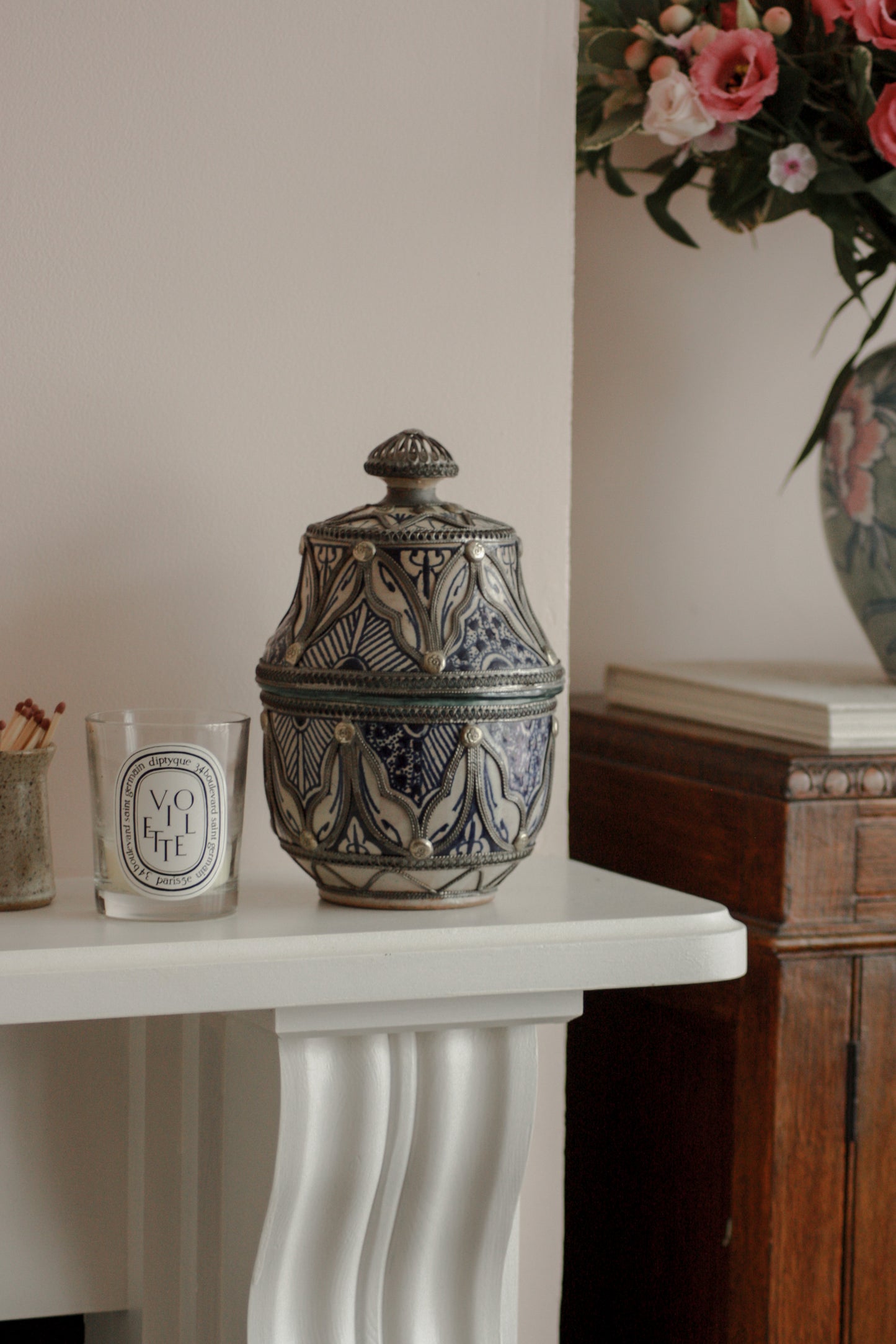 Early 20th century Moroccan ceramic pot with pewter shell