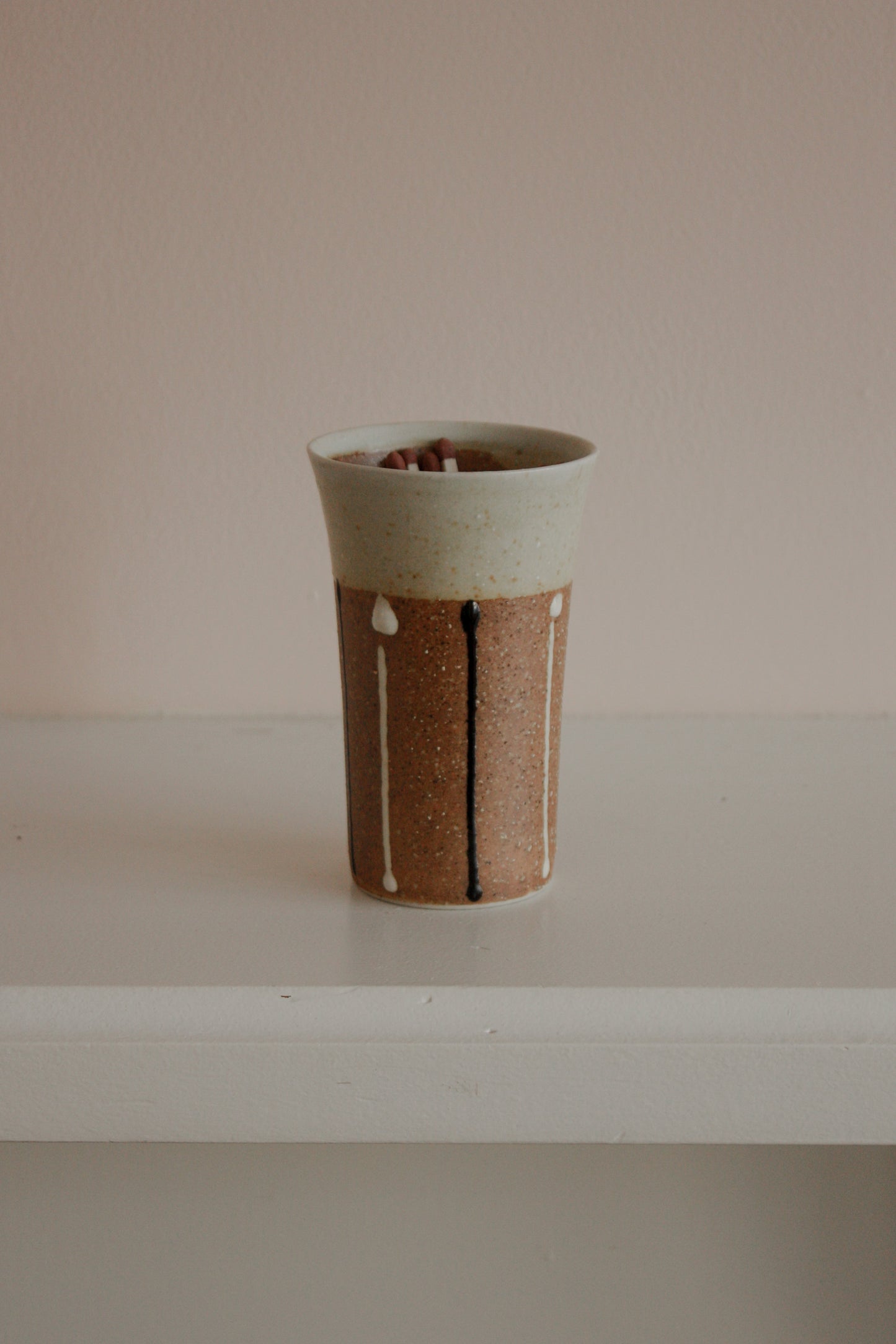 Contemporary pottery match pot