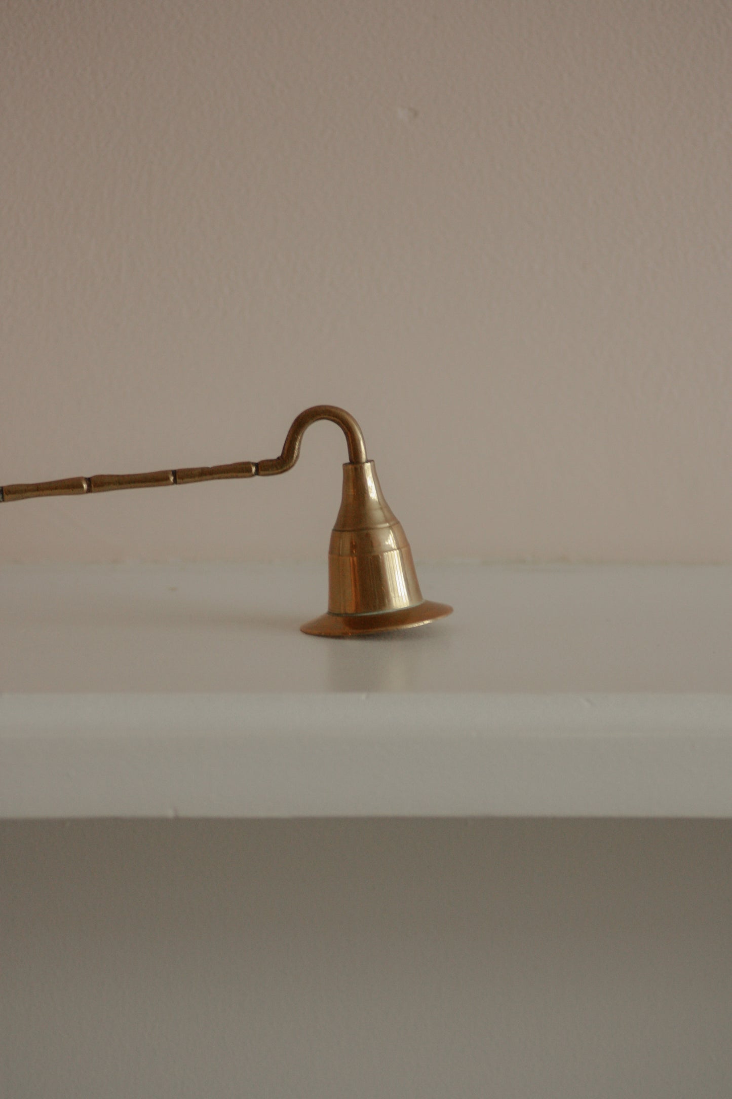 Vintage brass candle snuffer