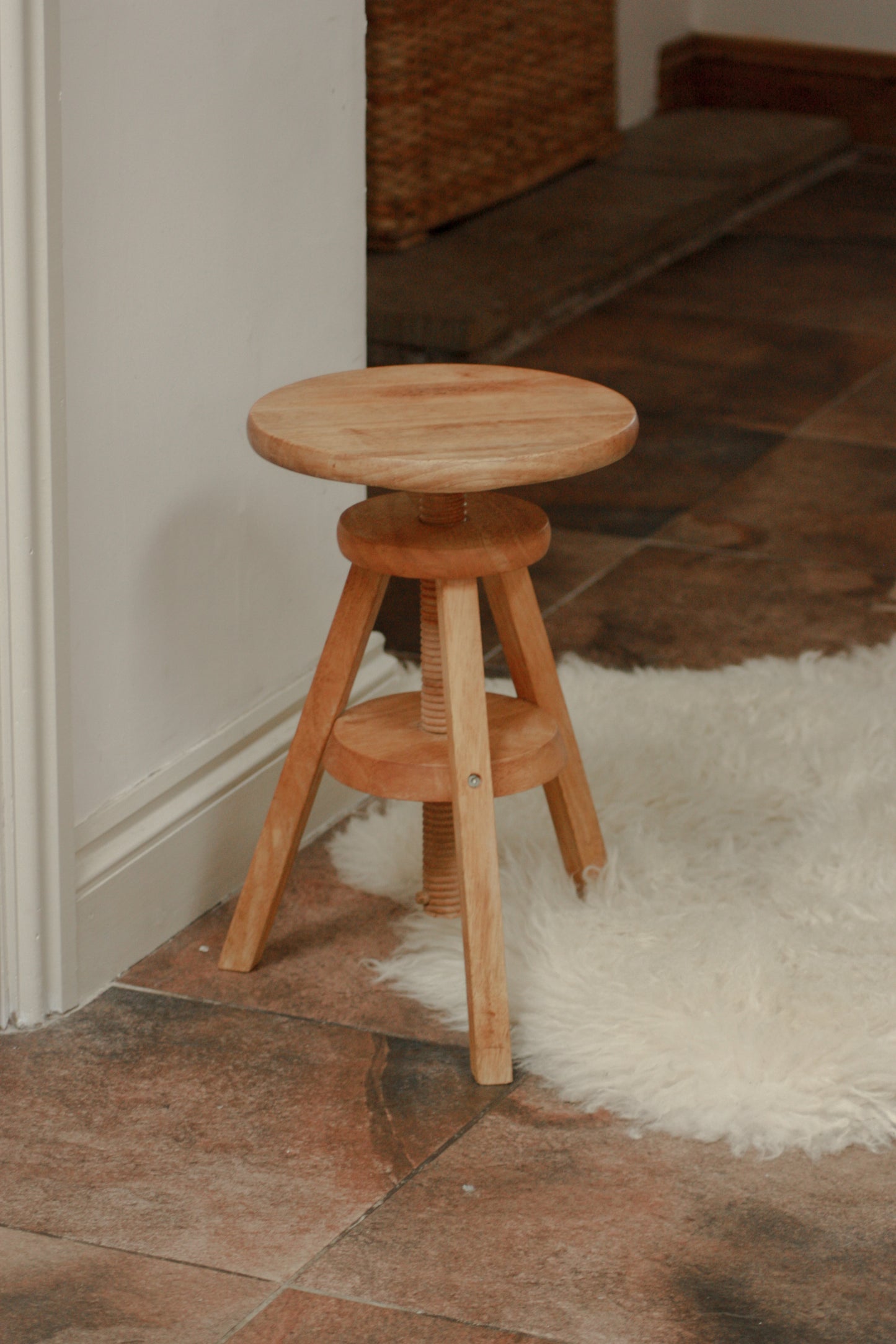 Vintage wooden stool with adjustable seat