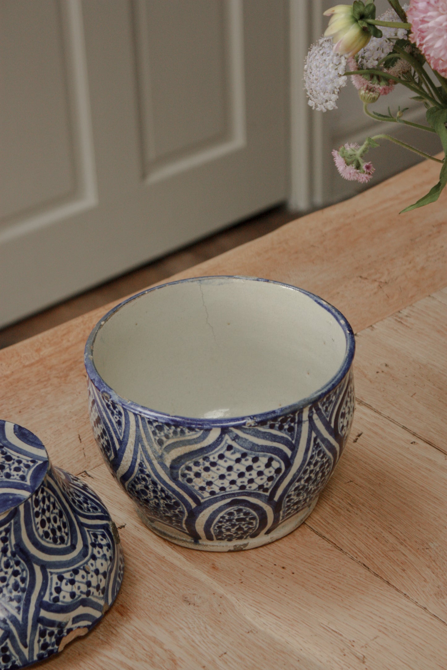 Vintage hand painted blue and white lidded pot