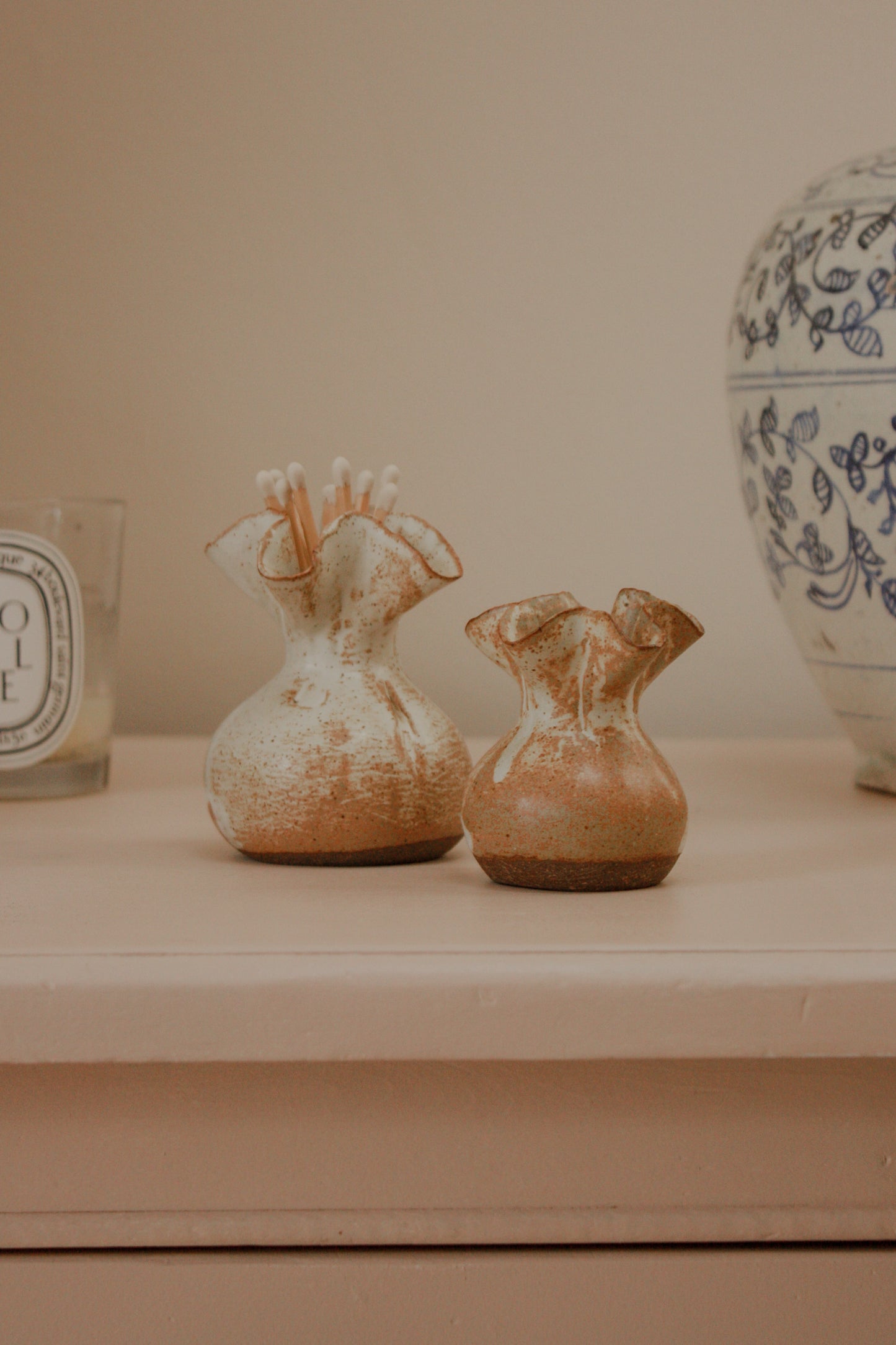 Pair vintage sculptural ruffle rim bud vases
