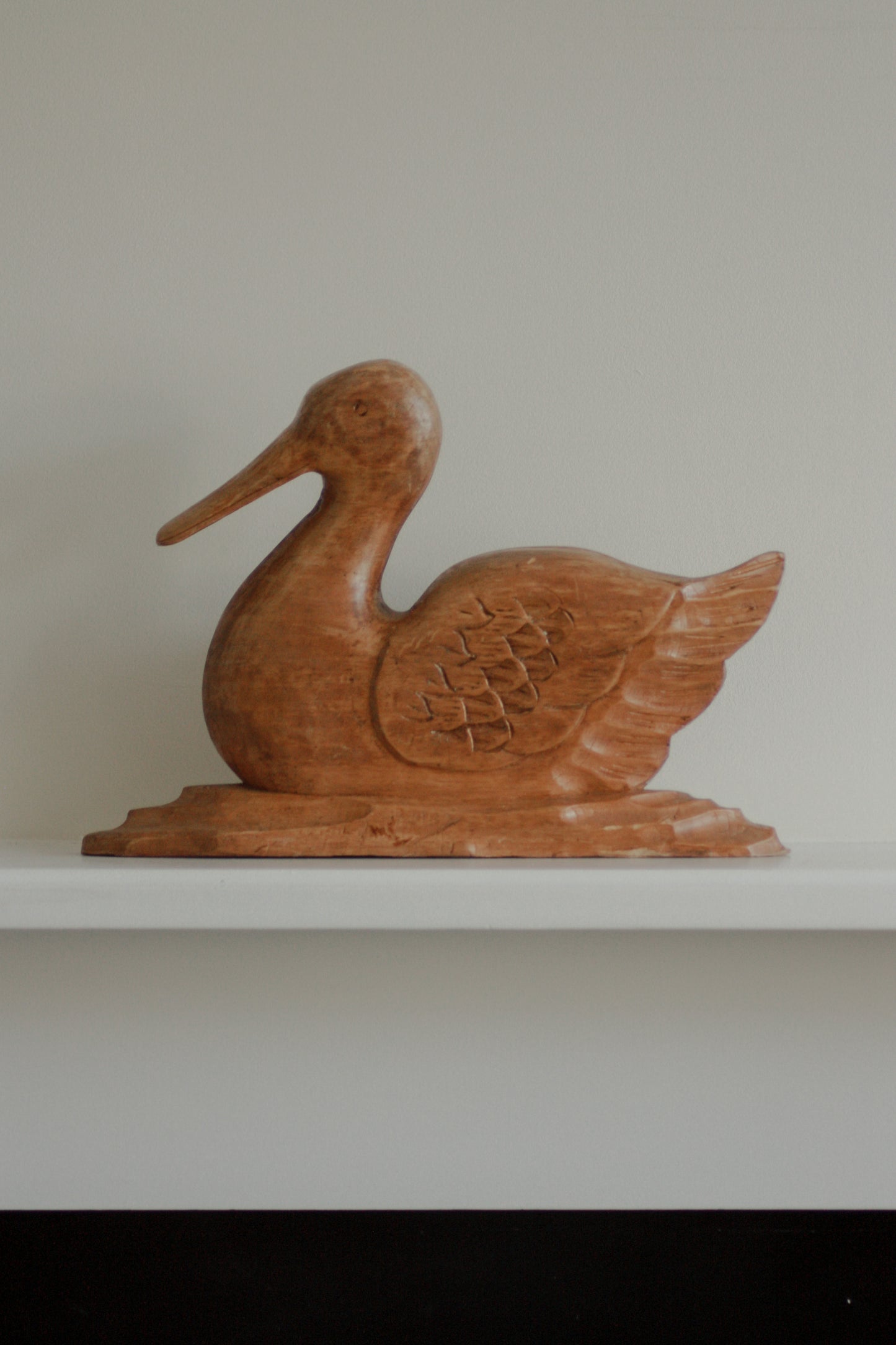 Vintage hand carved wooden duck sculpture