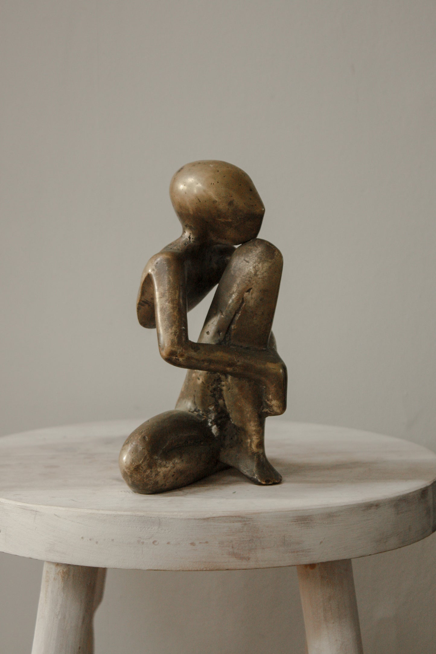 Vintage solid brass sculpture - “Pensive”