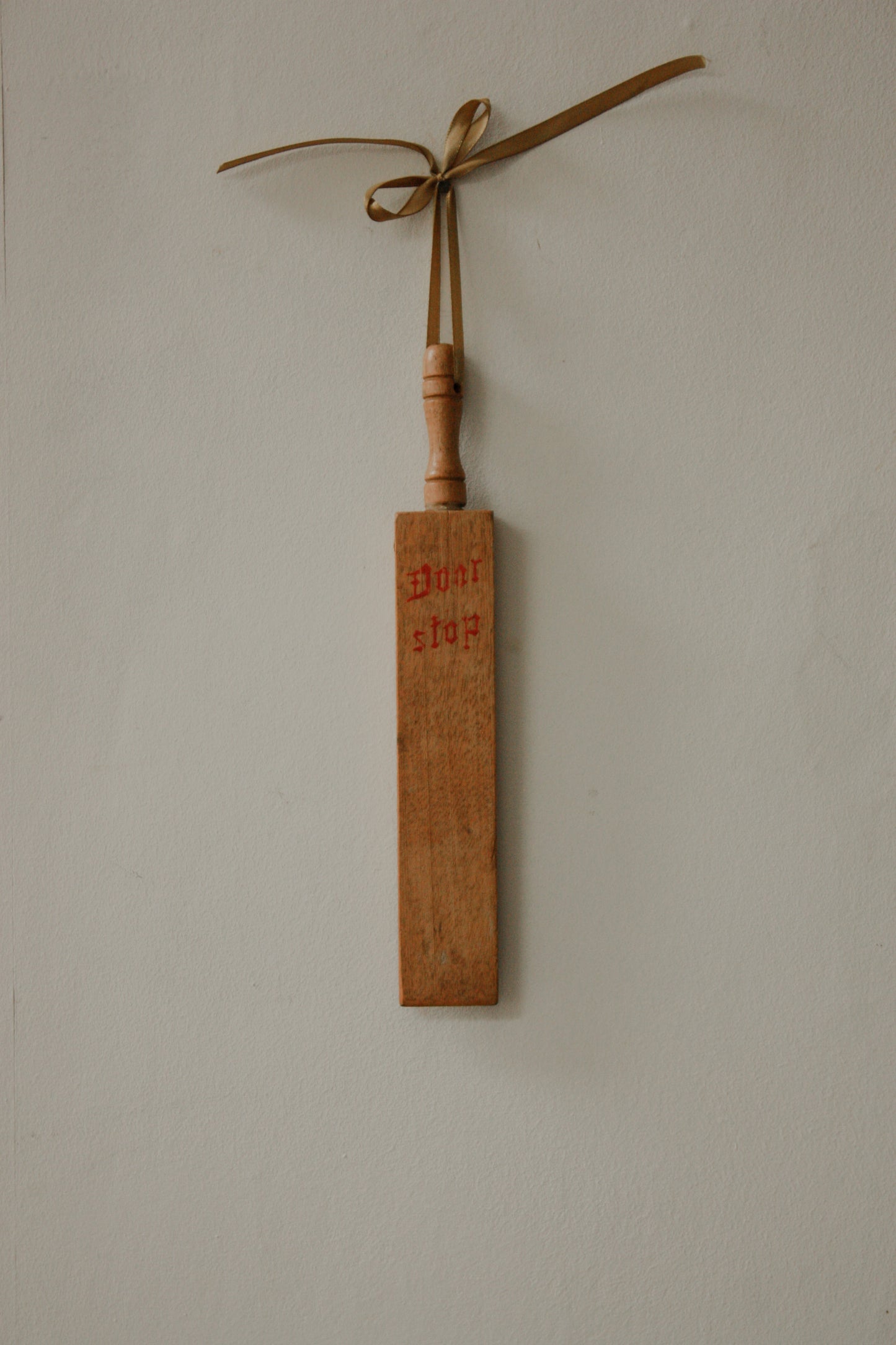 Vintage wooden doorstop
