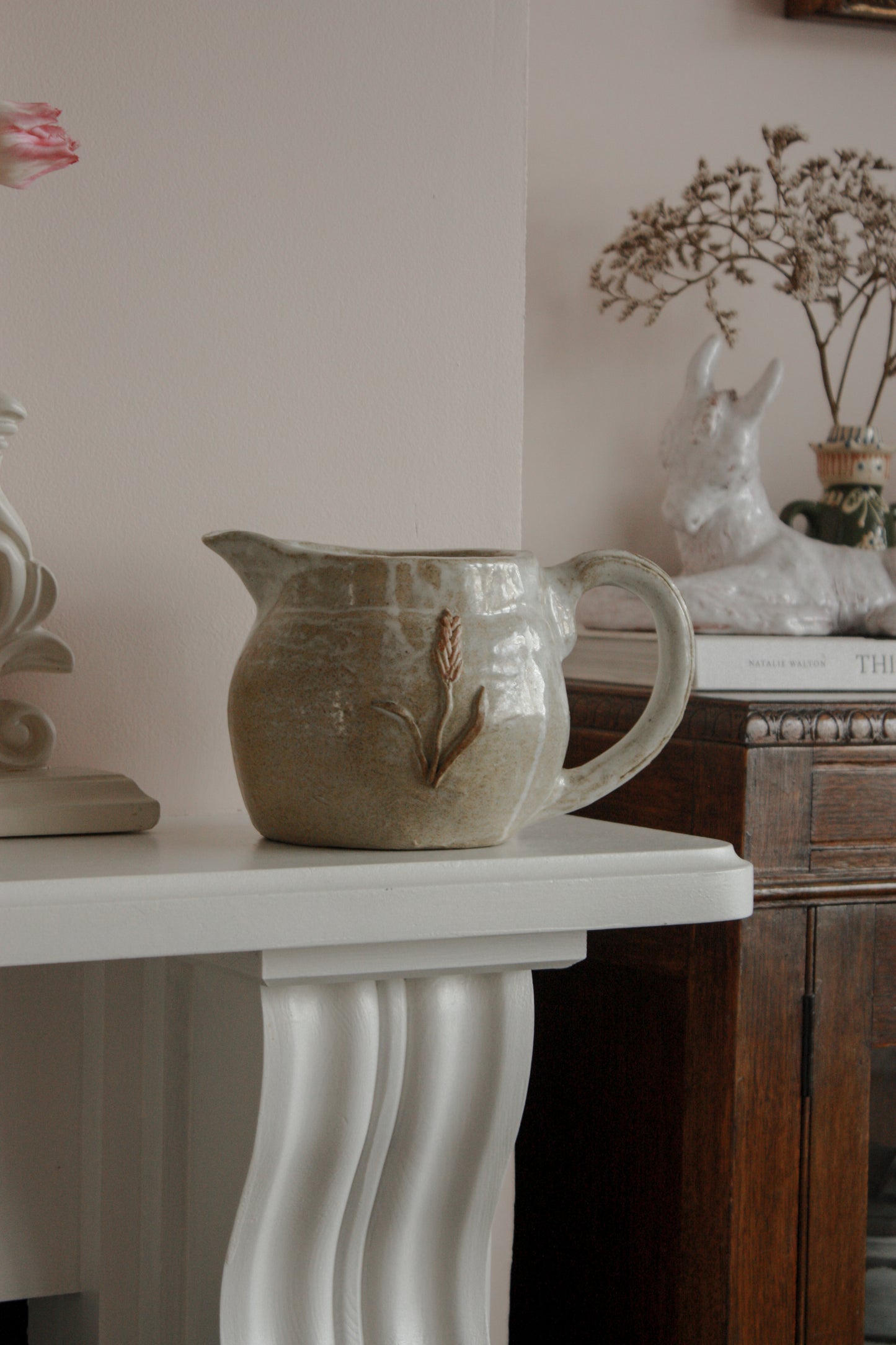 Vintage studio pottery pitcher with wheat design