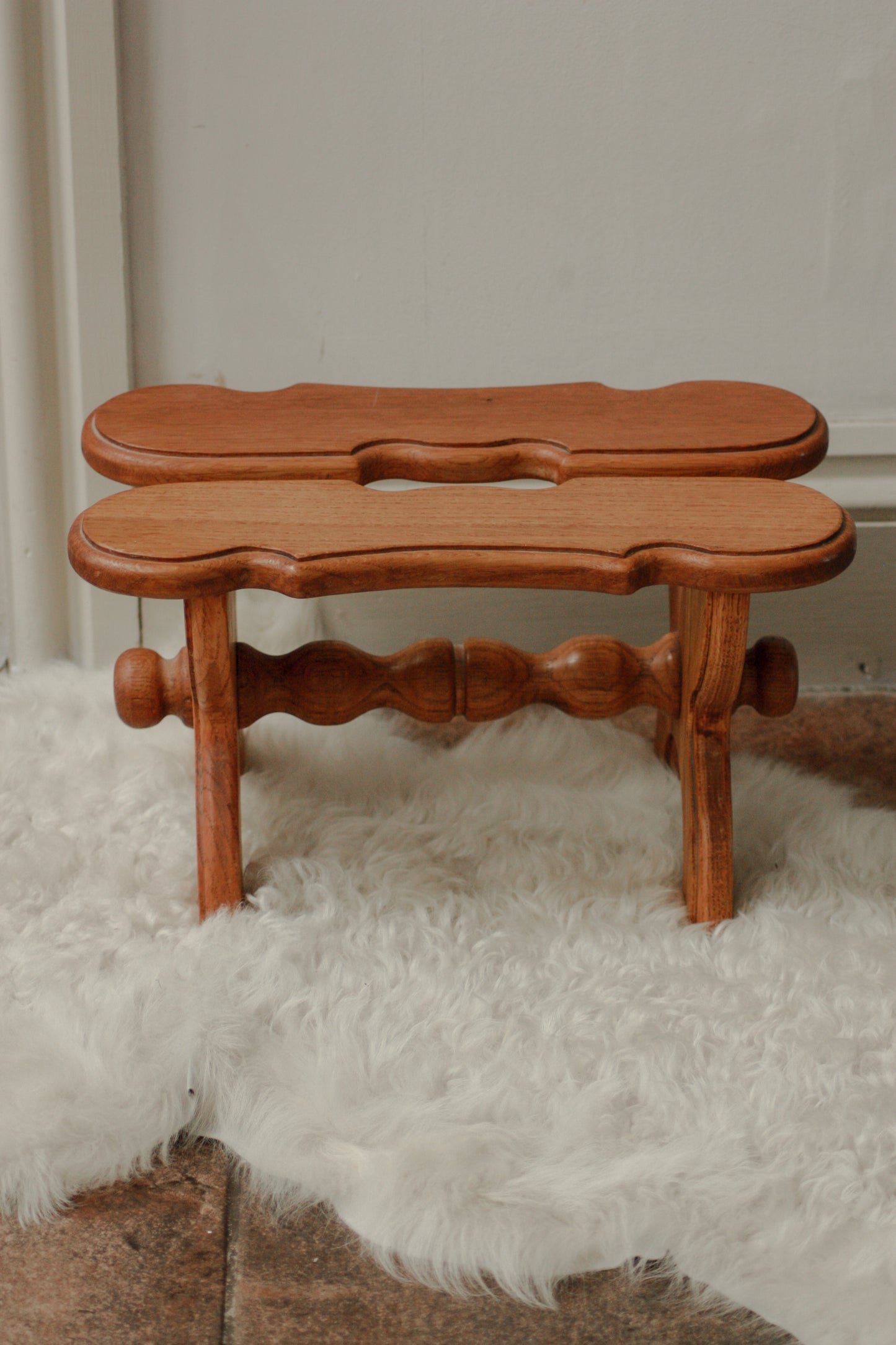 Vintage wooden stool with bobbin detail