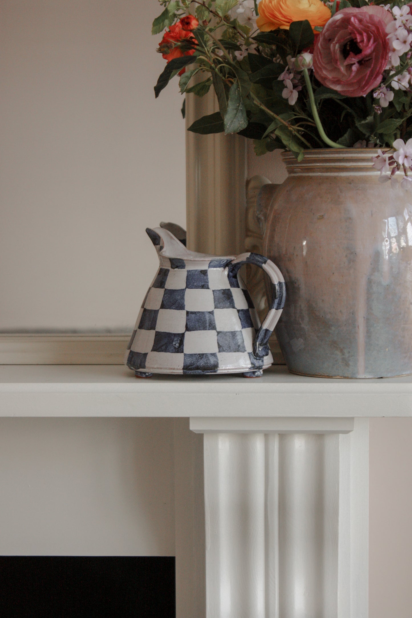 Studio pottery hand painted check jug