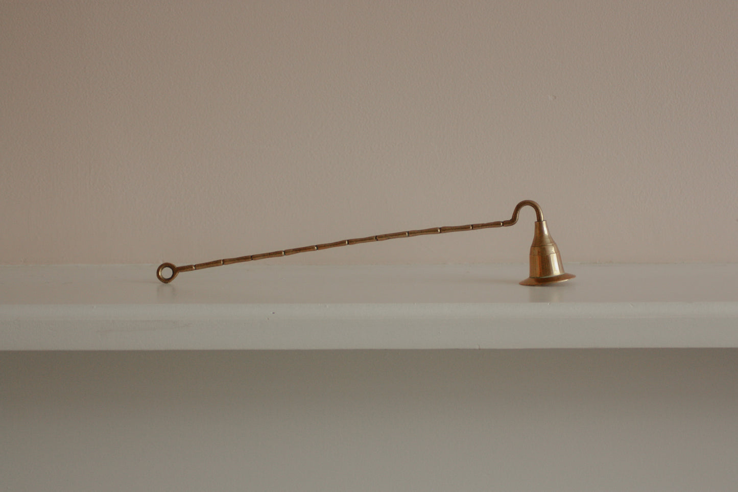 Vintage brass candle snuffer