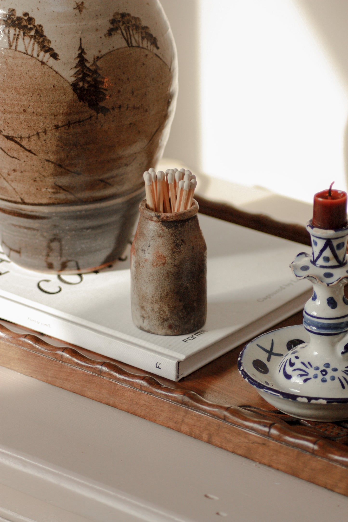 Vintage weathered and worn stoneware match pot