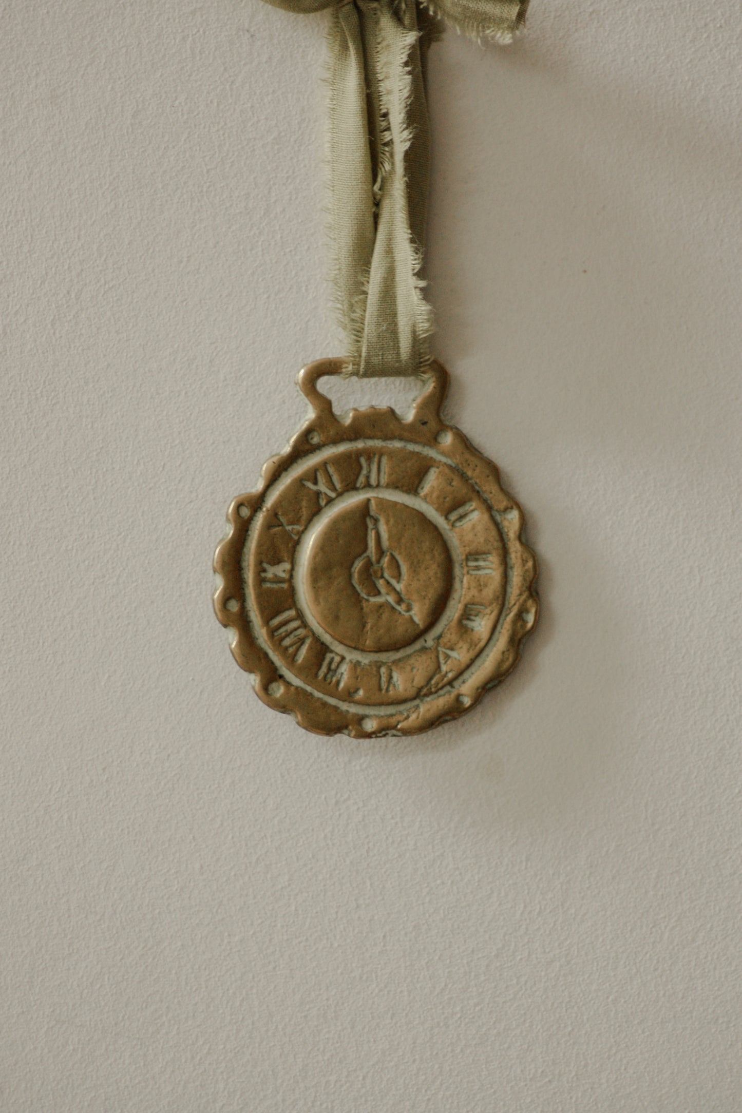 Vintage brass clock horse brass token